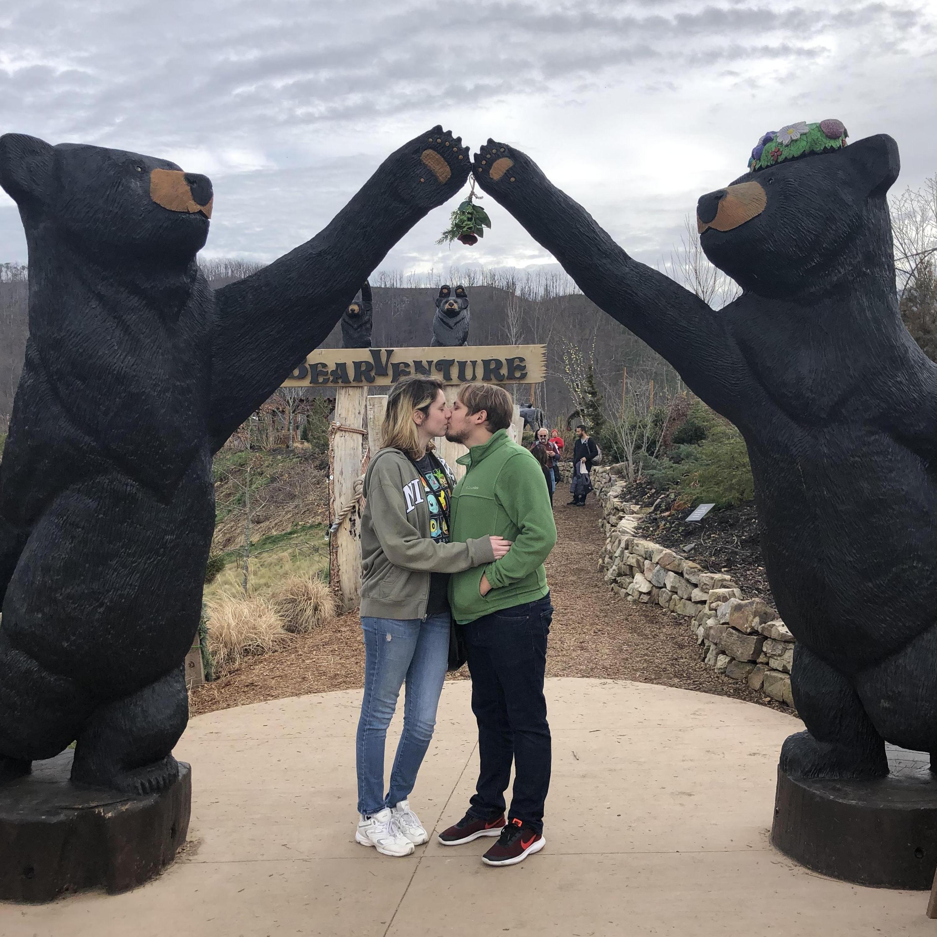 Can't resist kissing under some mistletoe held up by two black bears in the Smokies!