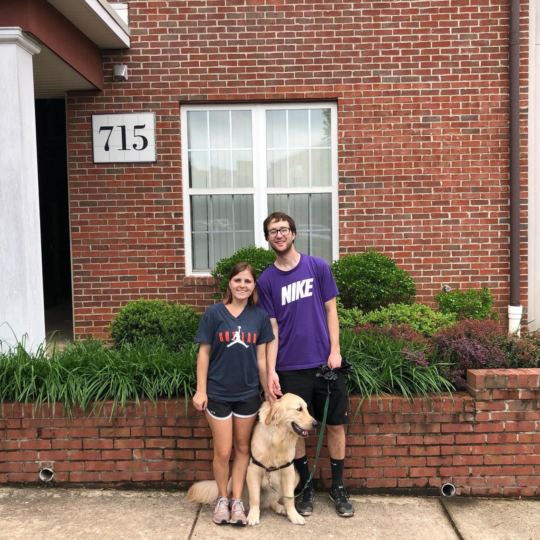 In front of our first apartment together in Walker Square, just before moving to DC in May 2019