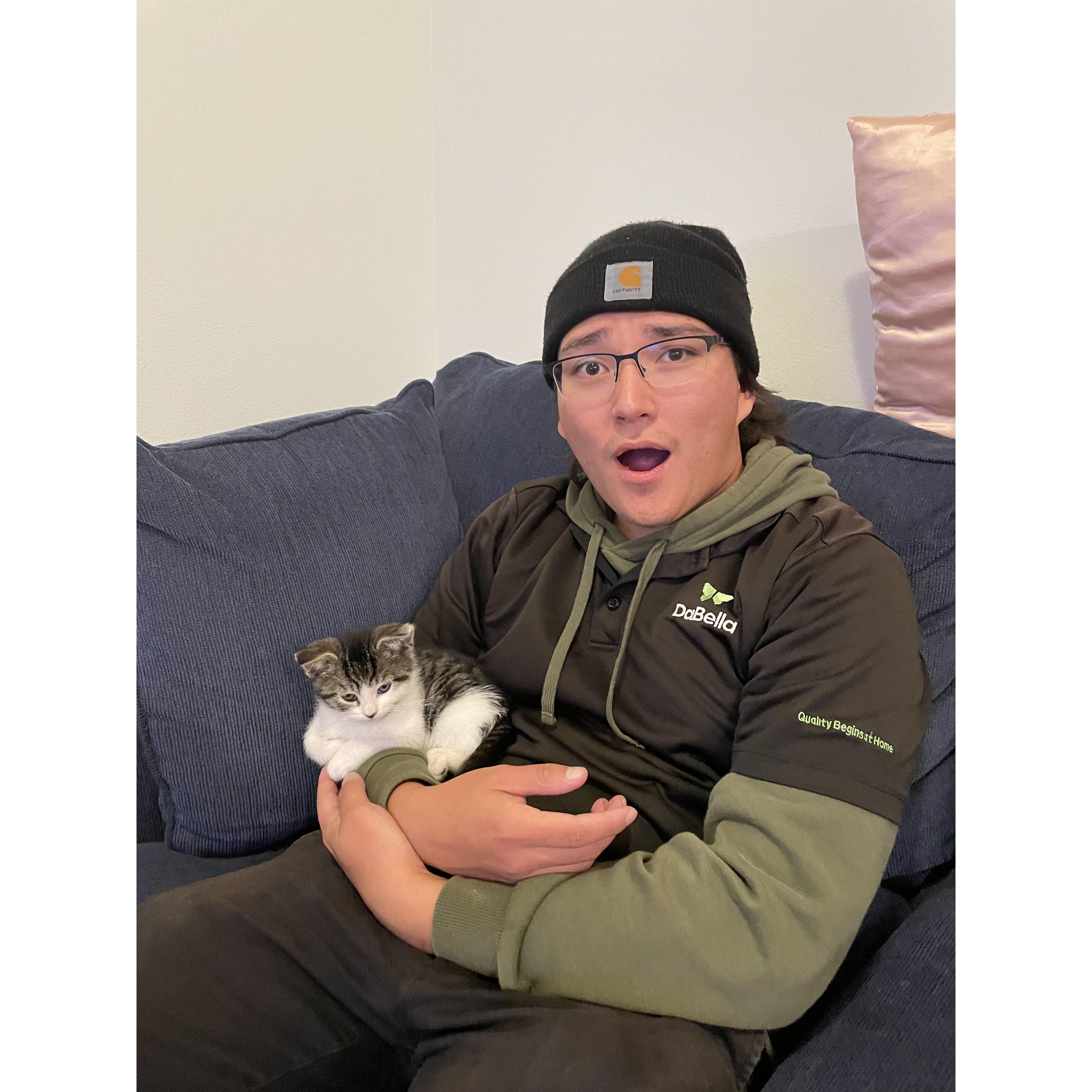 Surprising Kameron with our first cat/child Loaf