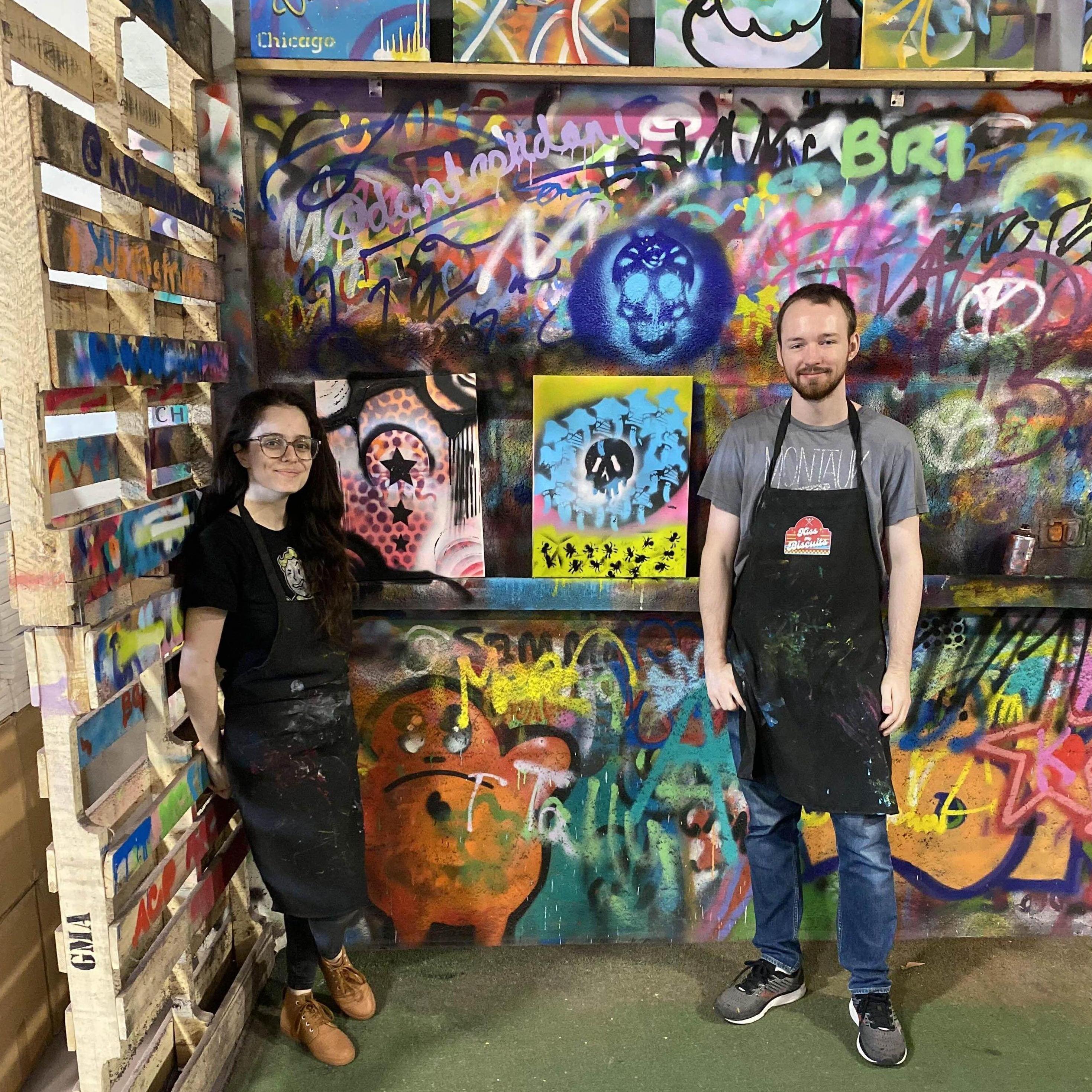 Sandra and Fenn at a spray paint art class for one of their aniversaries.