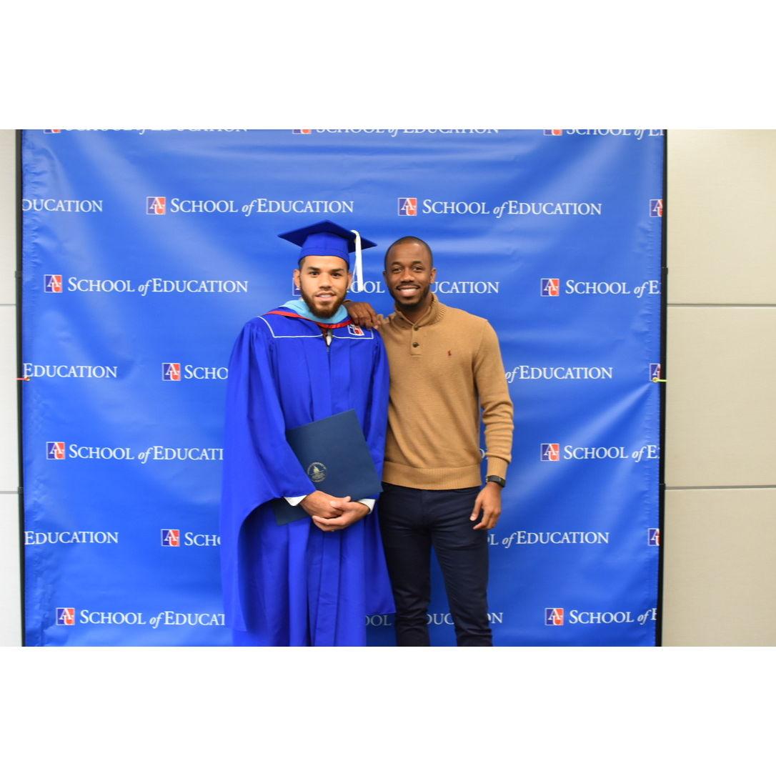 Marcus getting his Master's degree in 2018