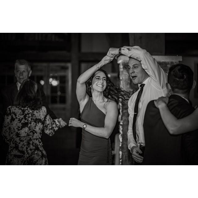 The happy couple ready to dance the night away with you
