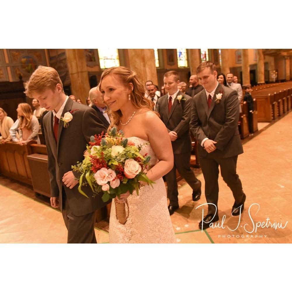 Each boy took turns walking his Mom down the aisle - and then all 3 gave her away