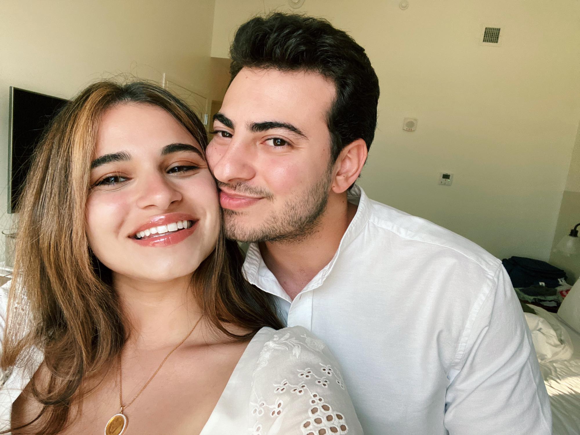 Moments before he proposed. 
Dalhia: Blissfully ignorant
Yousof: a rare soft smile, trying to keep cool before proposing