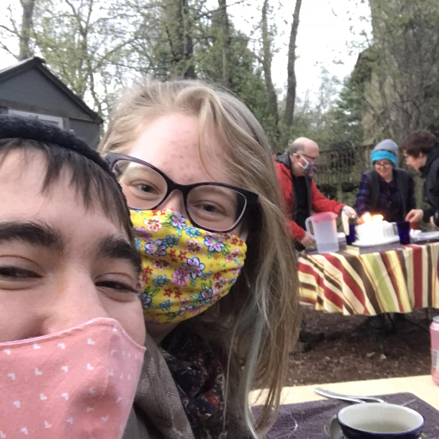 EP: Becoming official right before COVID meant we had to get creative about meeting one another's families. Here we are in the Quinlan's backyard celebrating Katie's (Emily's sister) birthday!