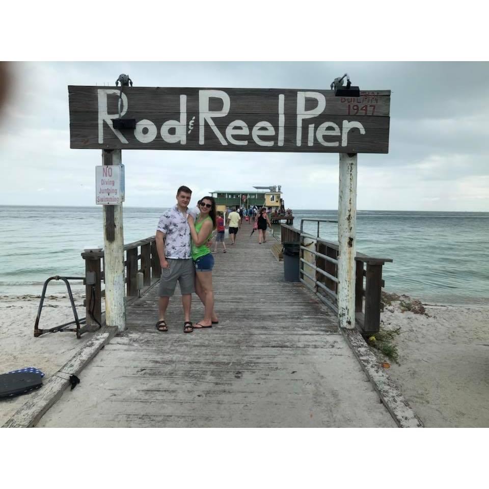 Taking a photo at the Rod and Reel Pier as part of Kacarab family tradition