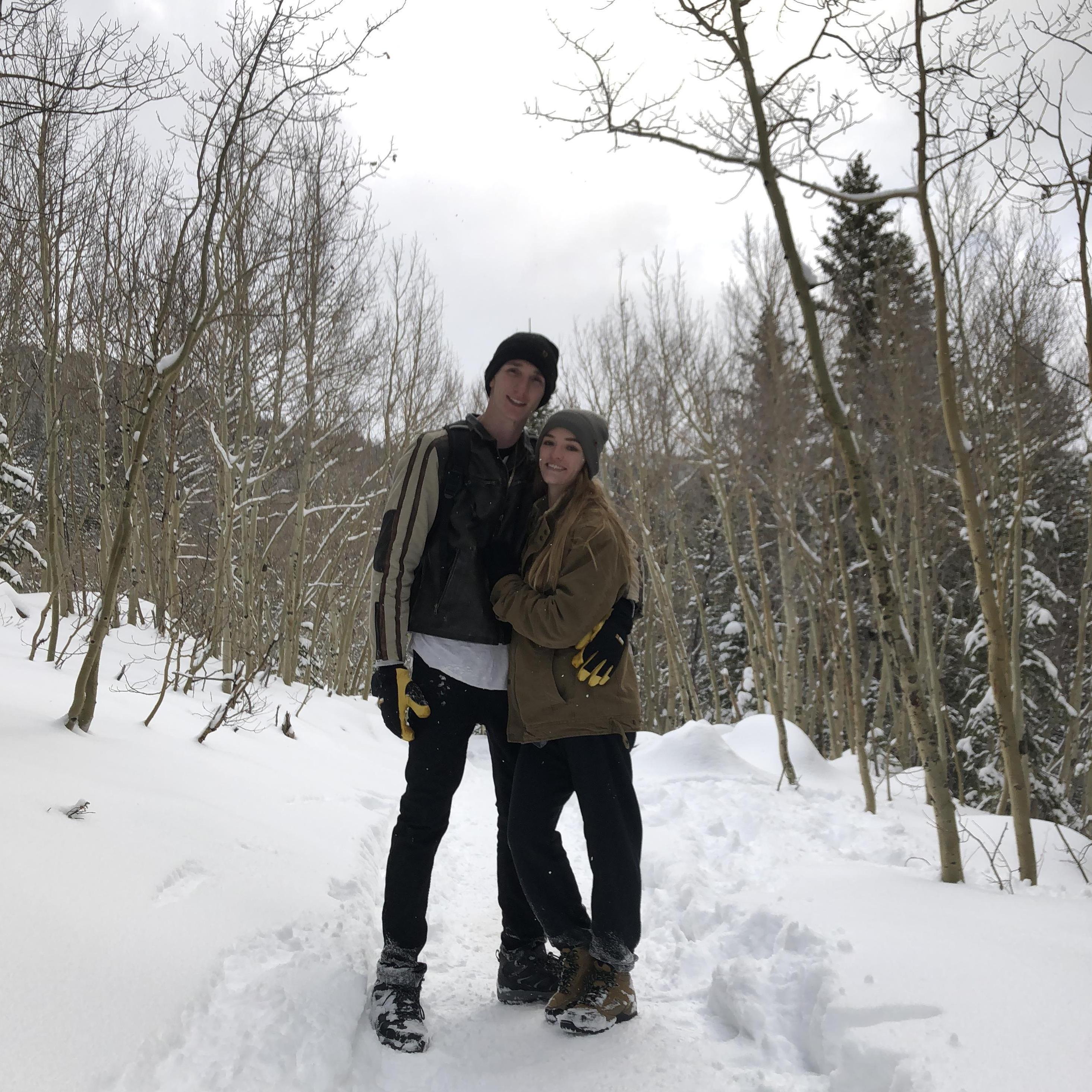 Lovebirds hiking through Rocky Mountain National Park during a 2018 visit to Colorado