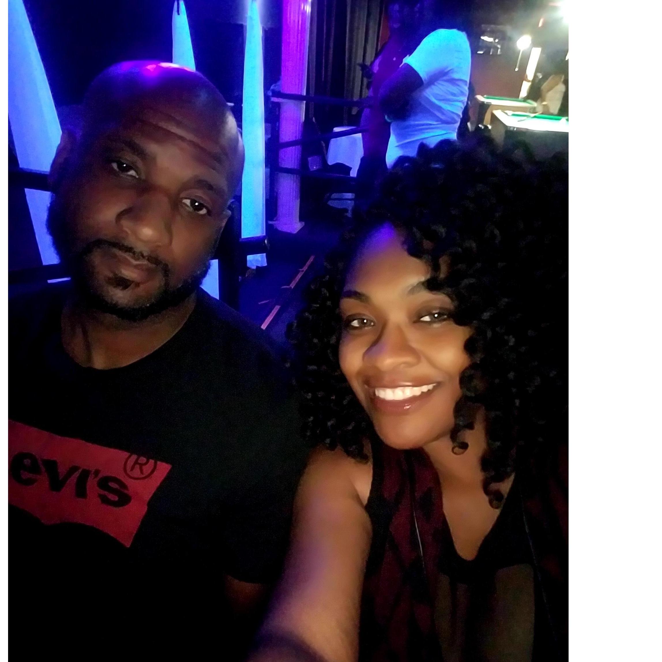 His face says im here for her....he is not a fan of GoGo music. lol