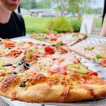 Grab a slice at the best pizza joint in town