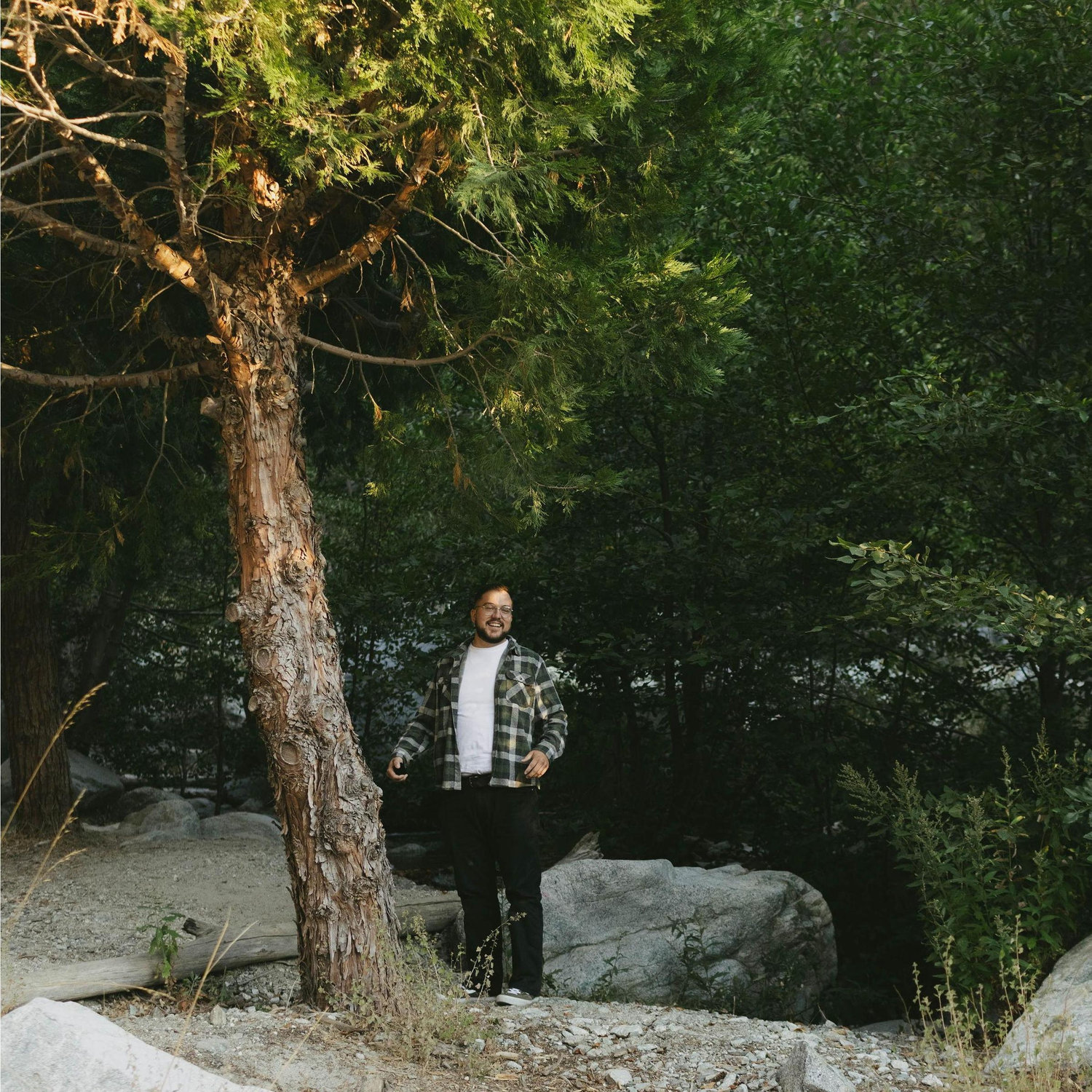 When Calvin popped out of the woods for their surprise proposal in Mt. Baldy