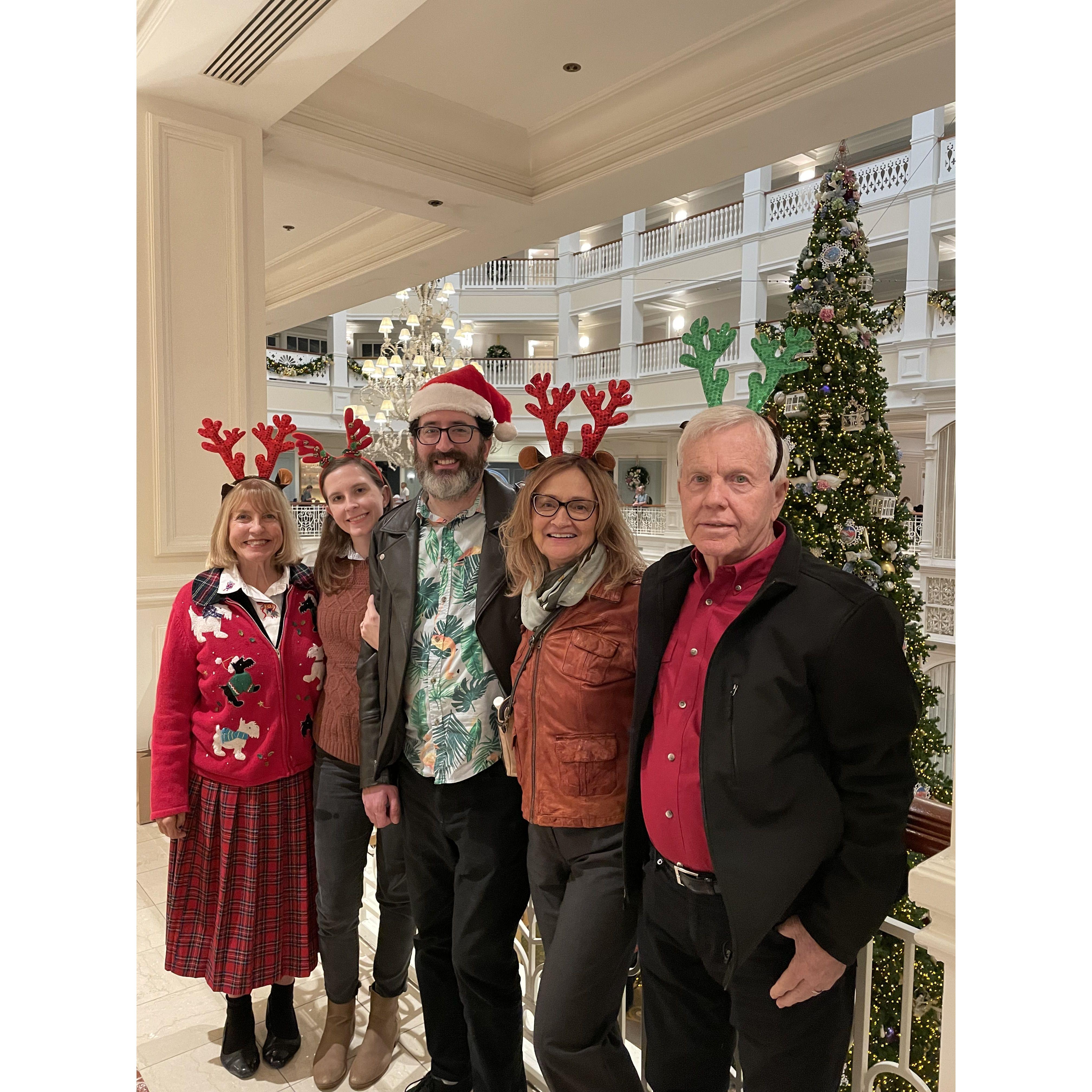 With Brian’s mom Diane, stepdad Terry, and Erika’s mom Lisa. December 2024