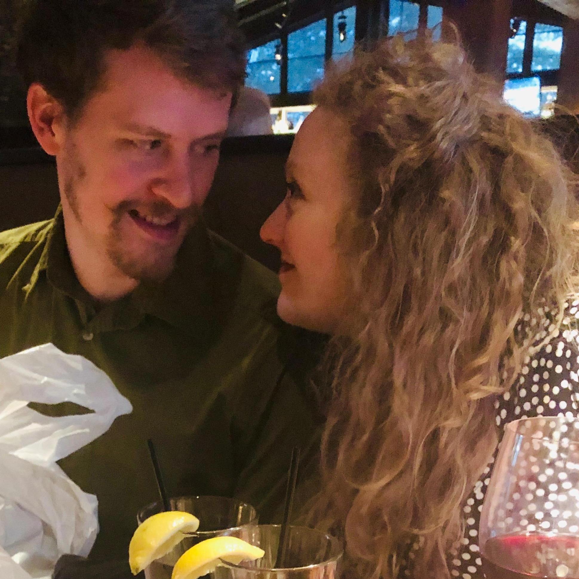 At Brian's parents' anniversary dinner, about two months into dating.