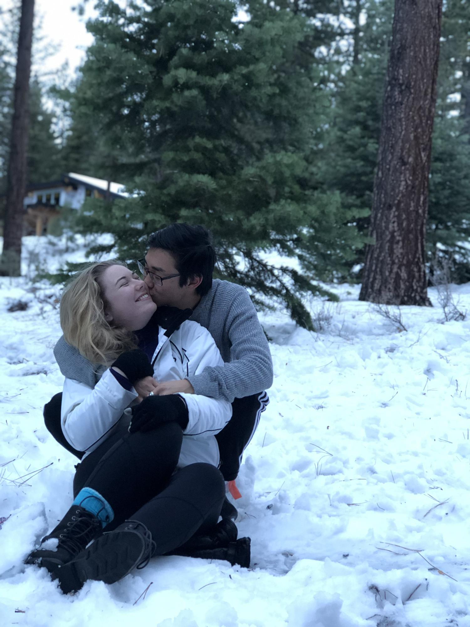 This picture was taken during our first trip to the snow together! Mattie sprained her ankle after slipping on ice, but David (+a sled) helped Mattie enjoy the snow :)