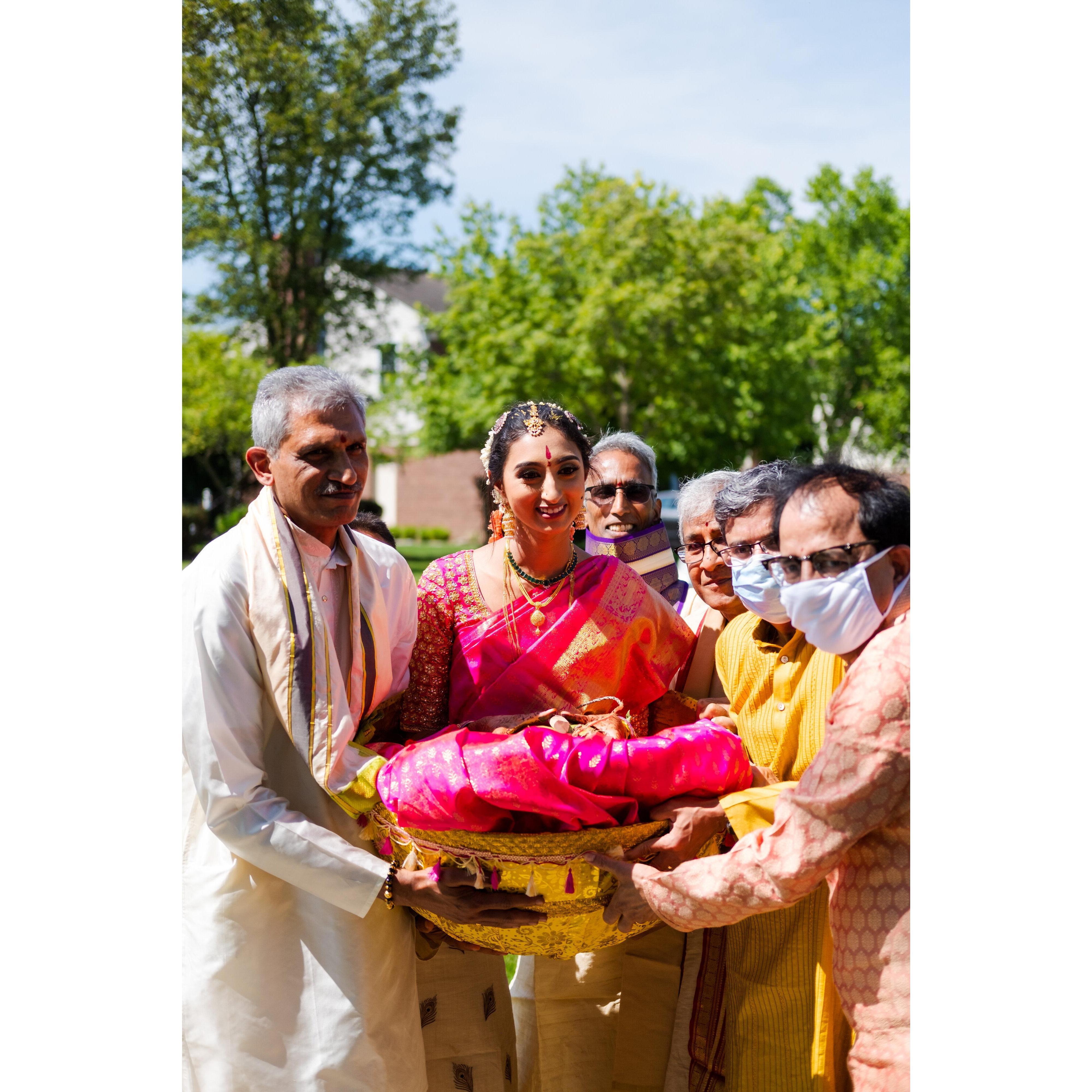 Annapurna being carried to the mandapam by her uncles
