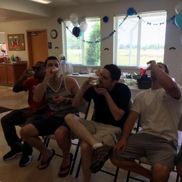 May 29th 2016-- Kenton sucking on a baby bottle at our best friend's baby shower to get my attention! (Spoiler alert: IT WORKED)