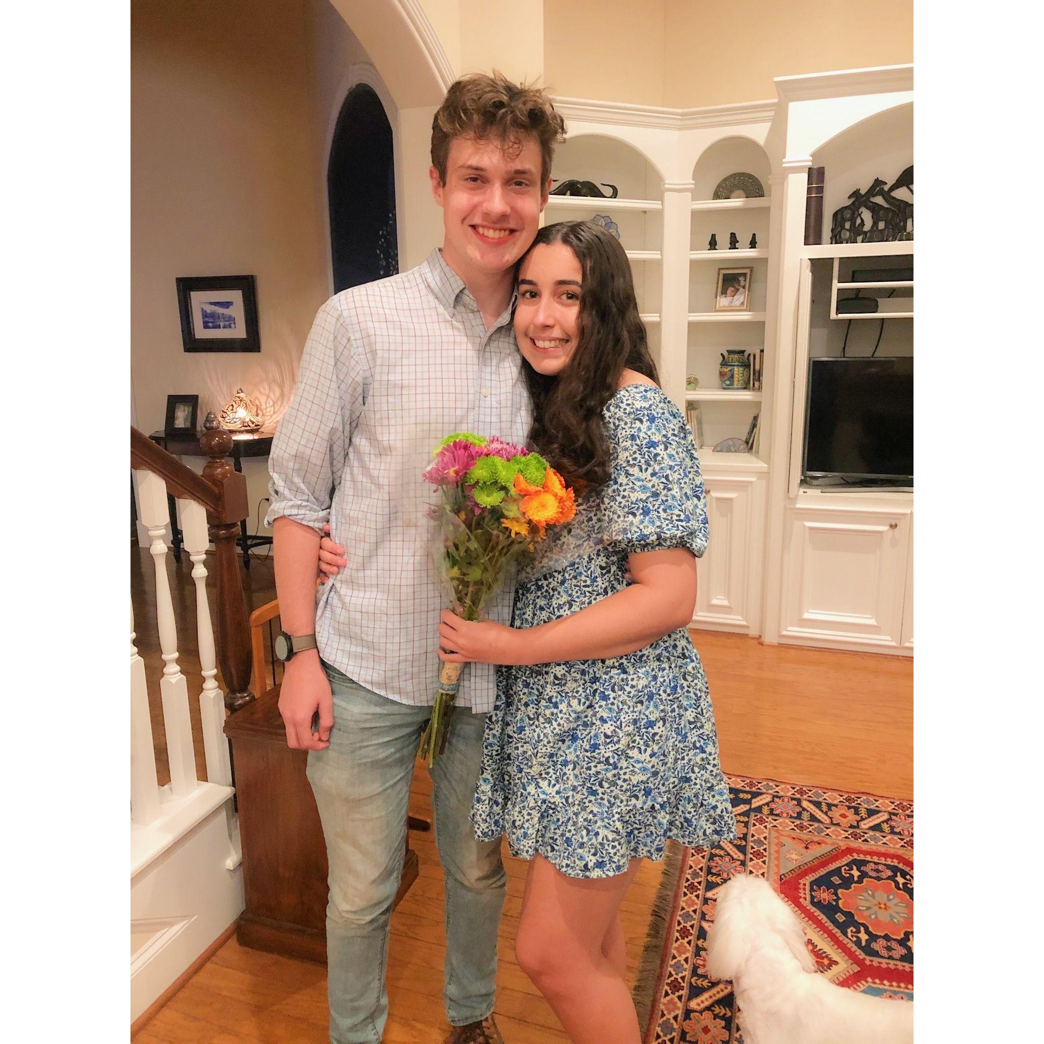 1 month into dating :) Jackson brought Sydney flowers after her last first day of high school!