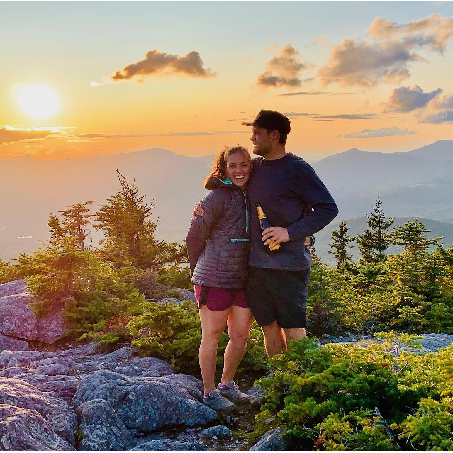 Celebrating our engagement with friends at the top of Mt. Hunger in Waterbury, VT
