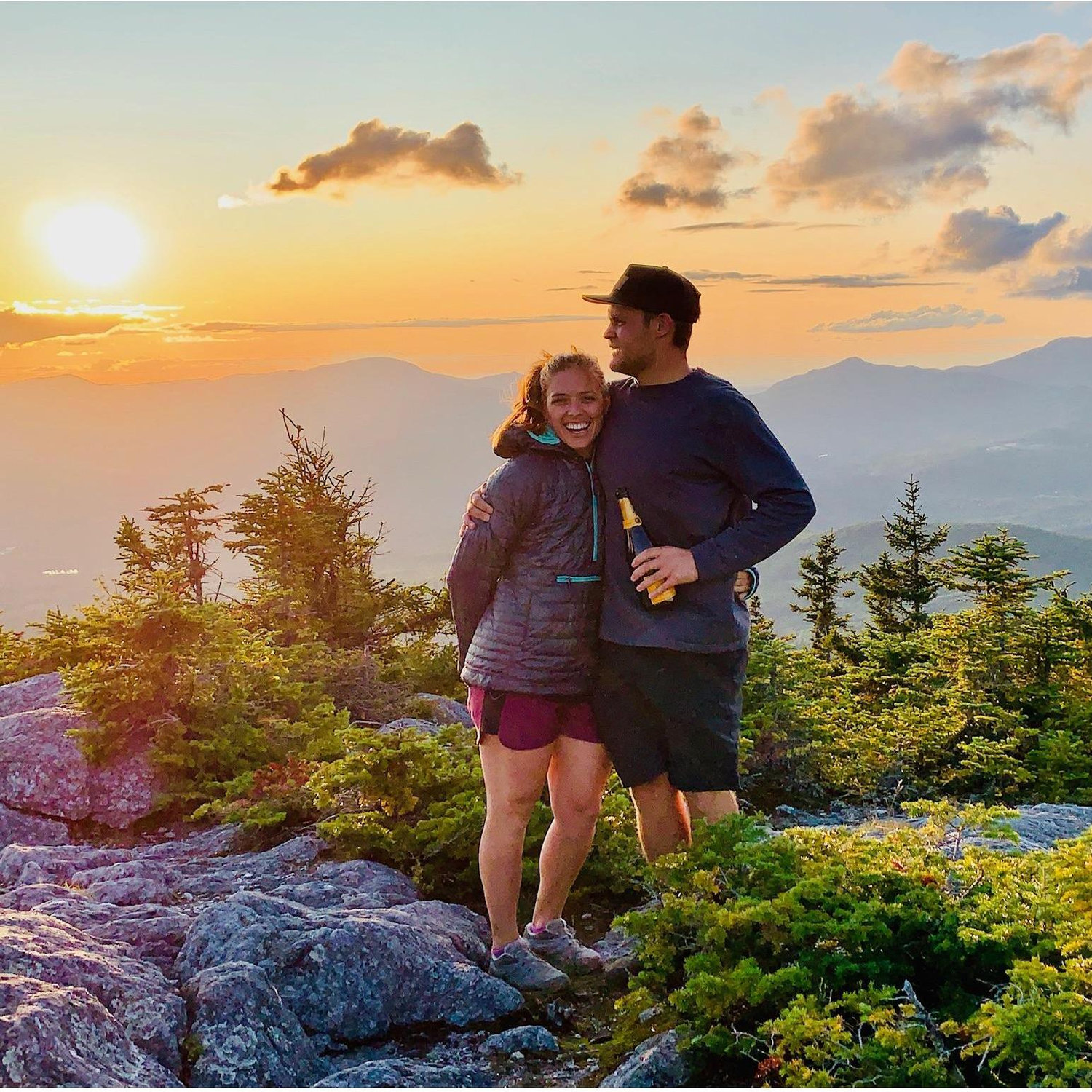 Celebrating our engagement with friends at the top of Mt. Hunger in Waterbury, VT