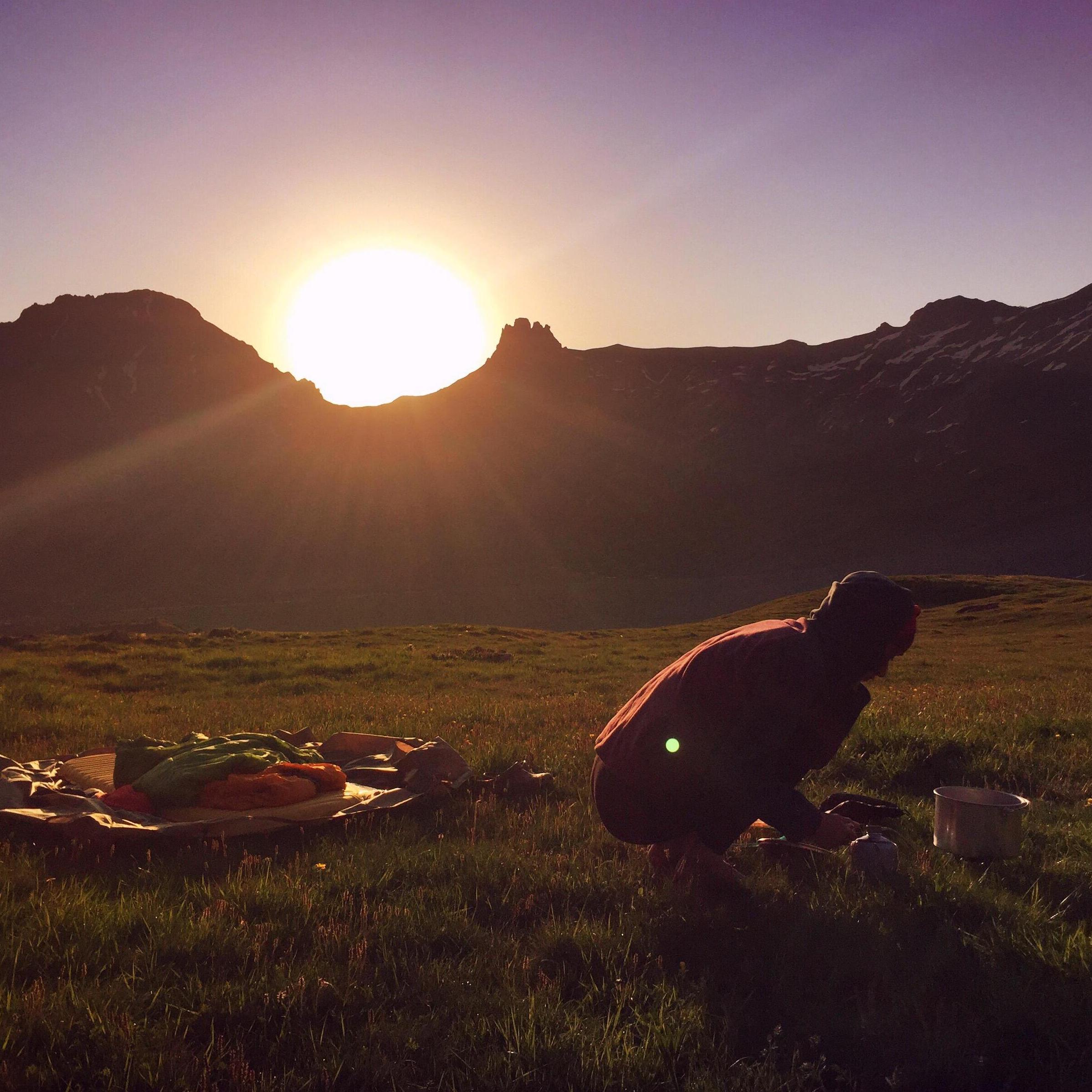 Sarah rising early while leading an Overland trip in the Alps