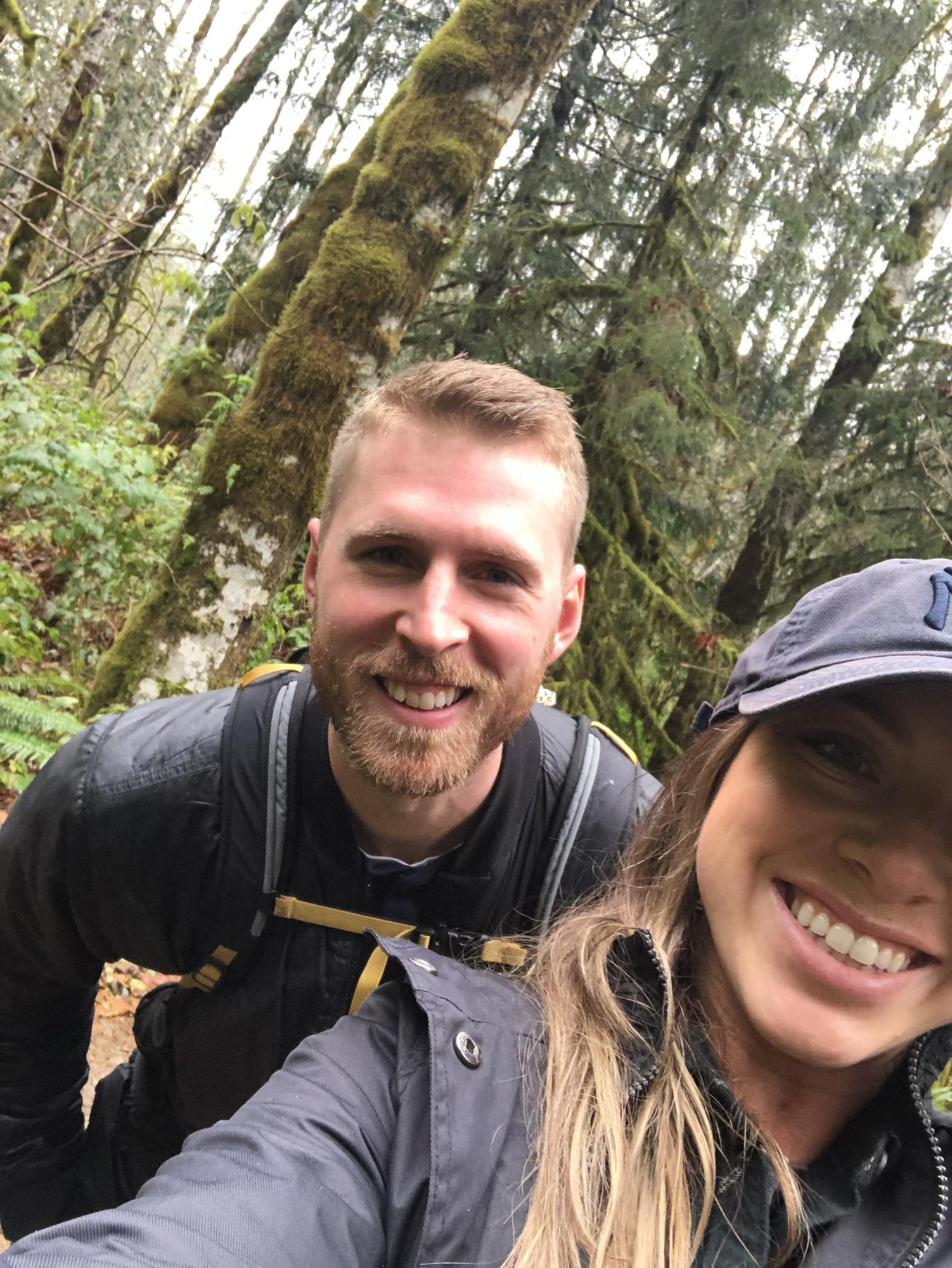 All smiles while on a long rainy hike in Washington