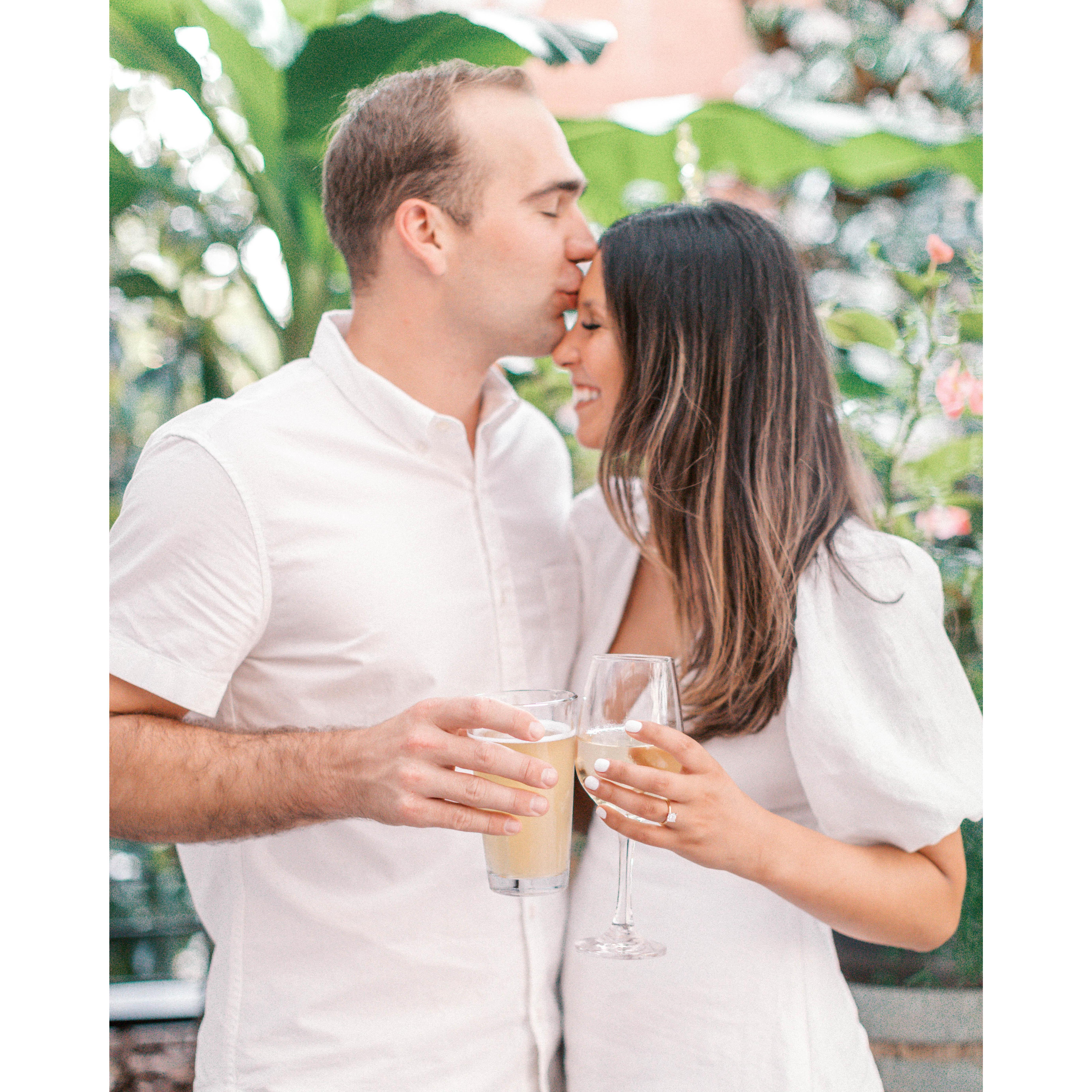 Cheersing to the start of our engagement shoot at one of our favorite rooftop spots in Raleigh — Taverna Agora!
