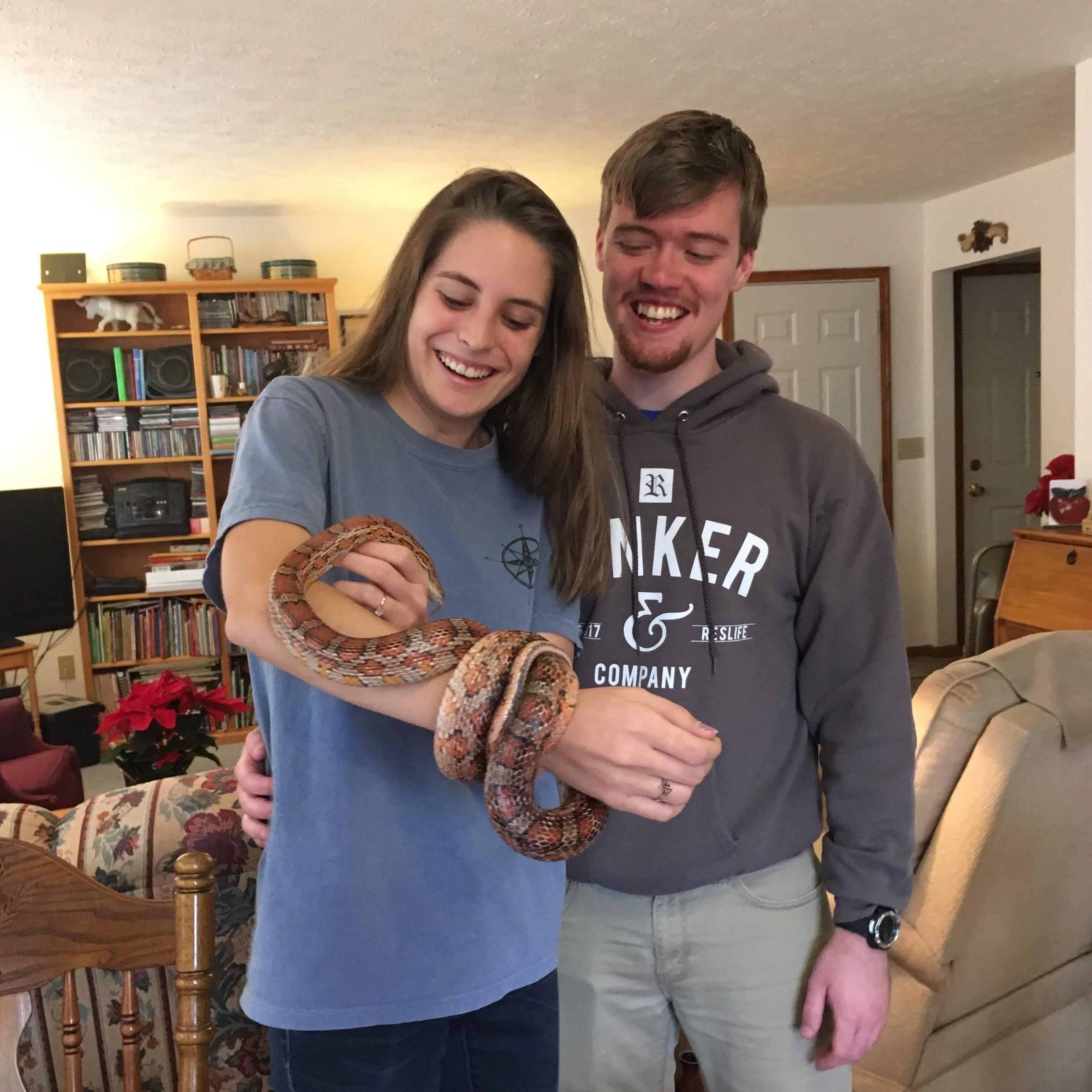 Holding Justin's pet snake for the first time.
