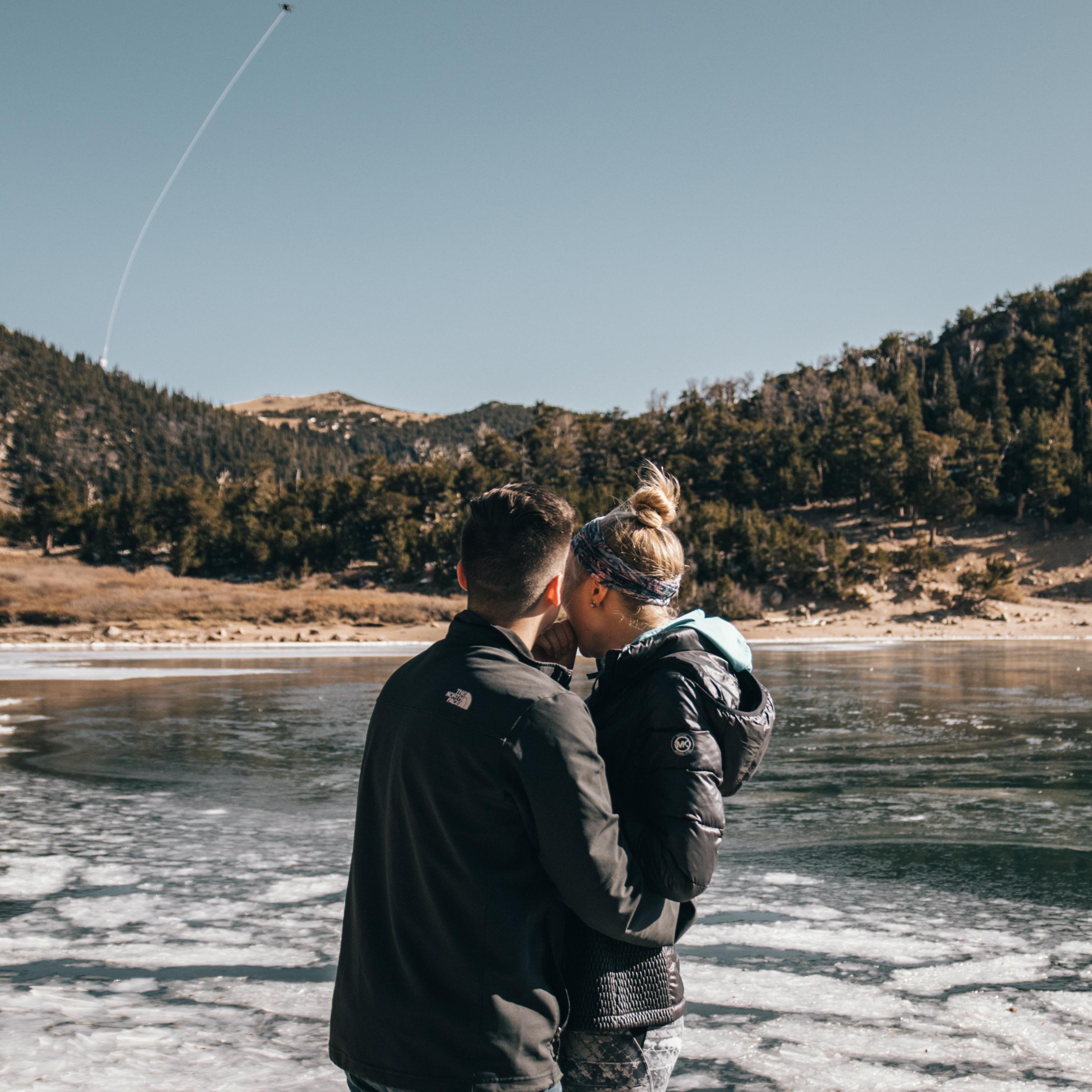 The ring just casually attached to a drone dangling above a frozen lake.