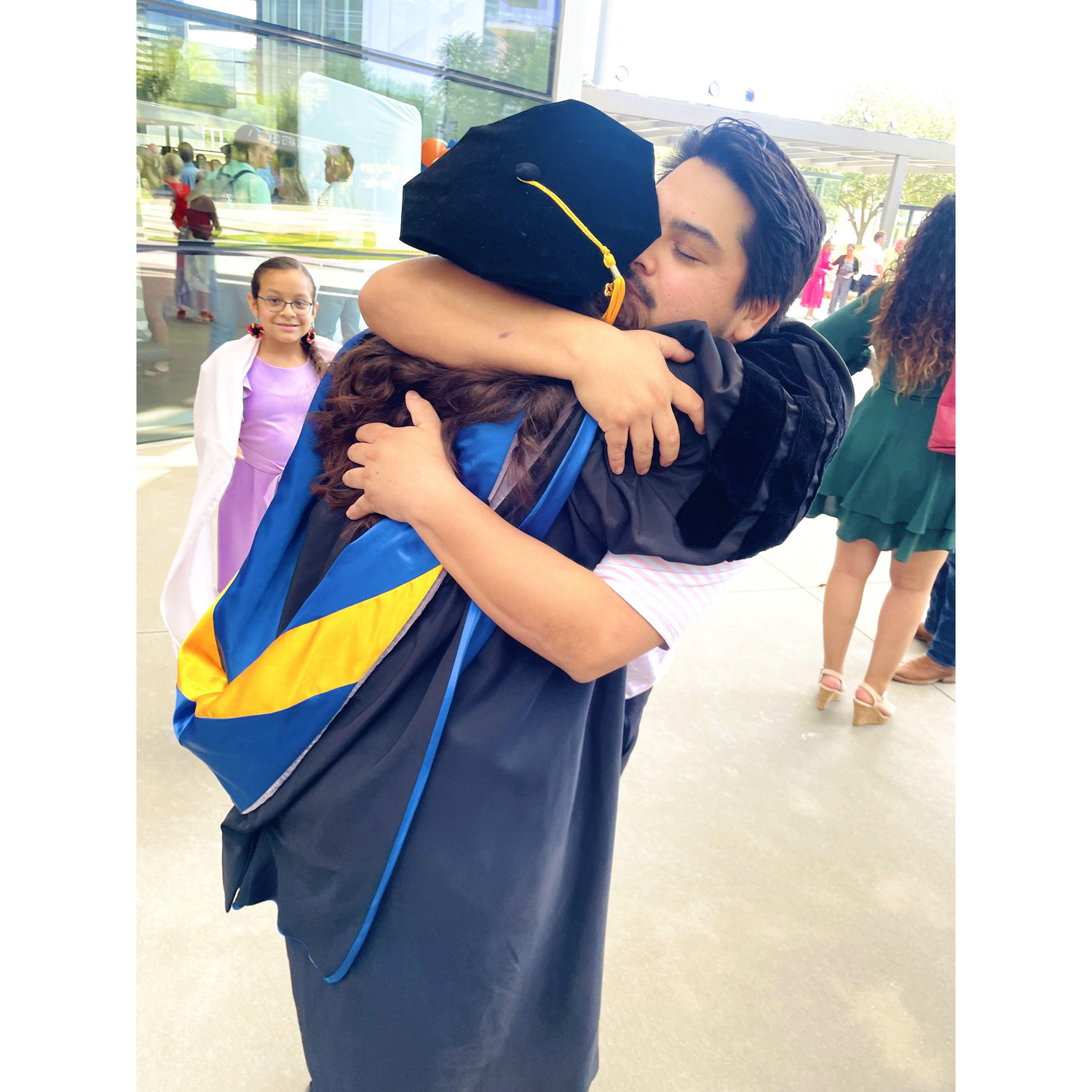 Viviana with her biggest fan at graduation.