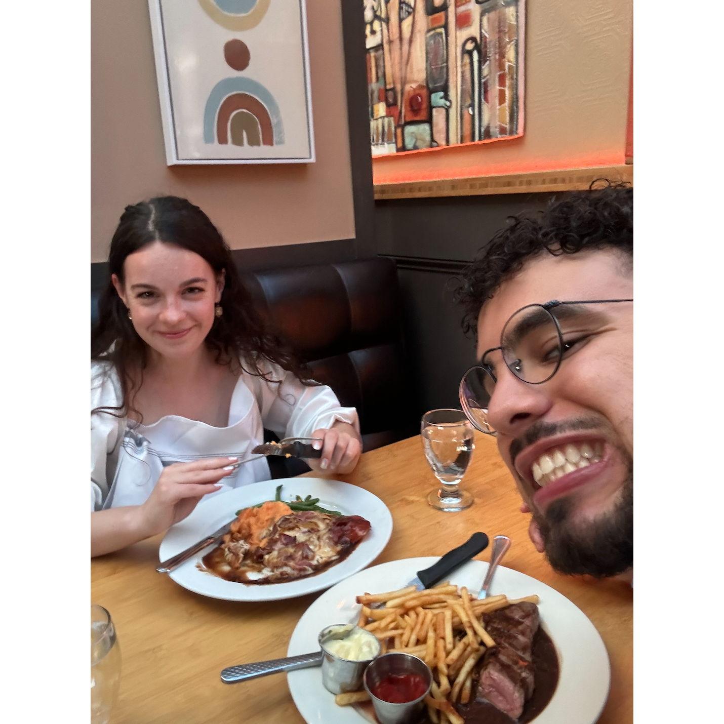 the face of a man about to propose. the face of a woman about to steal some fries