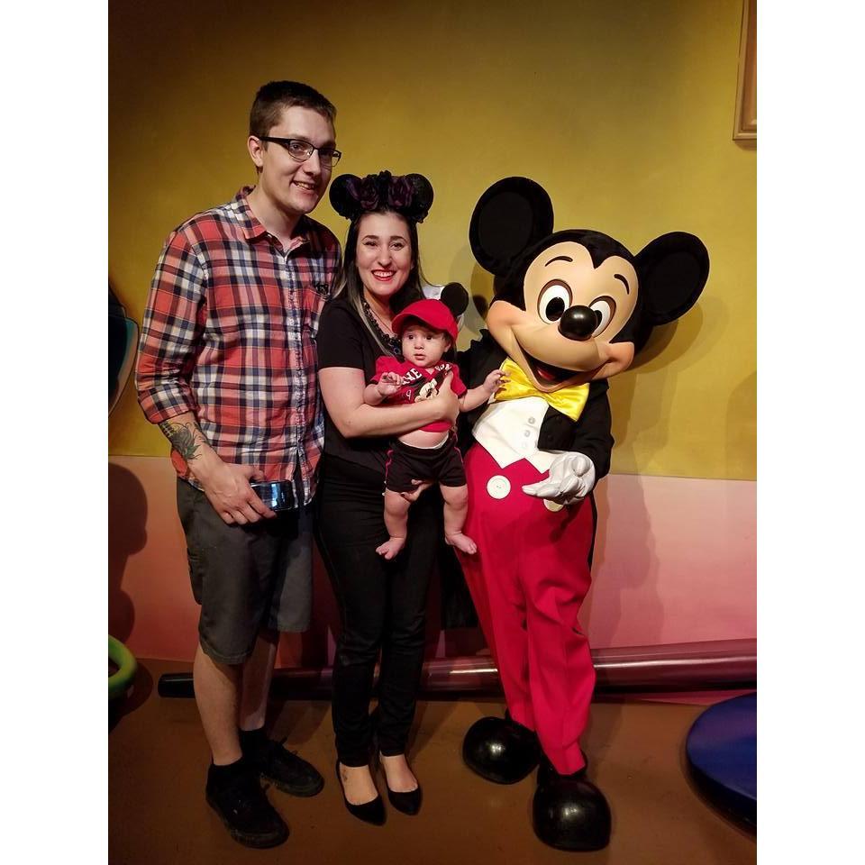 Finn meeting Mickey for the first time with mama and dada