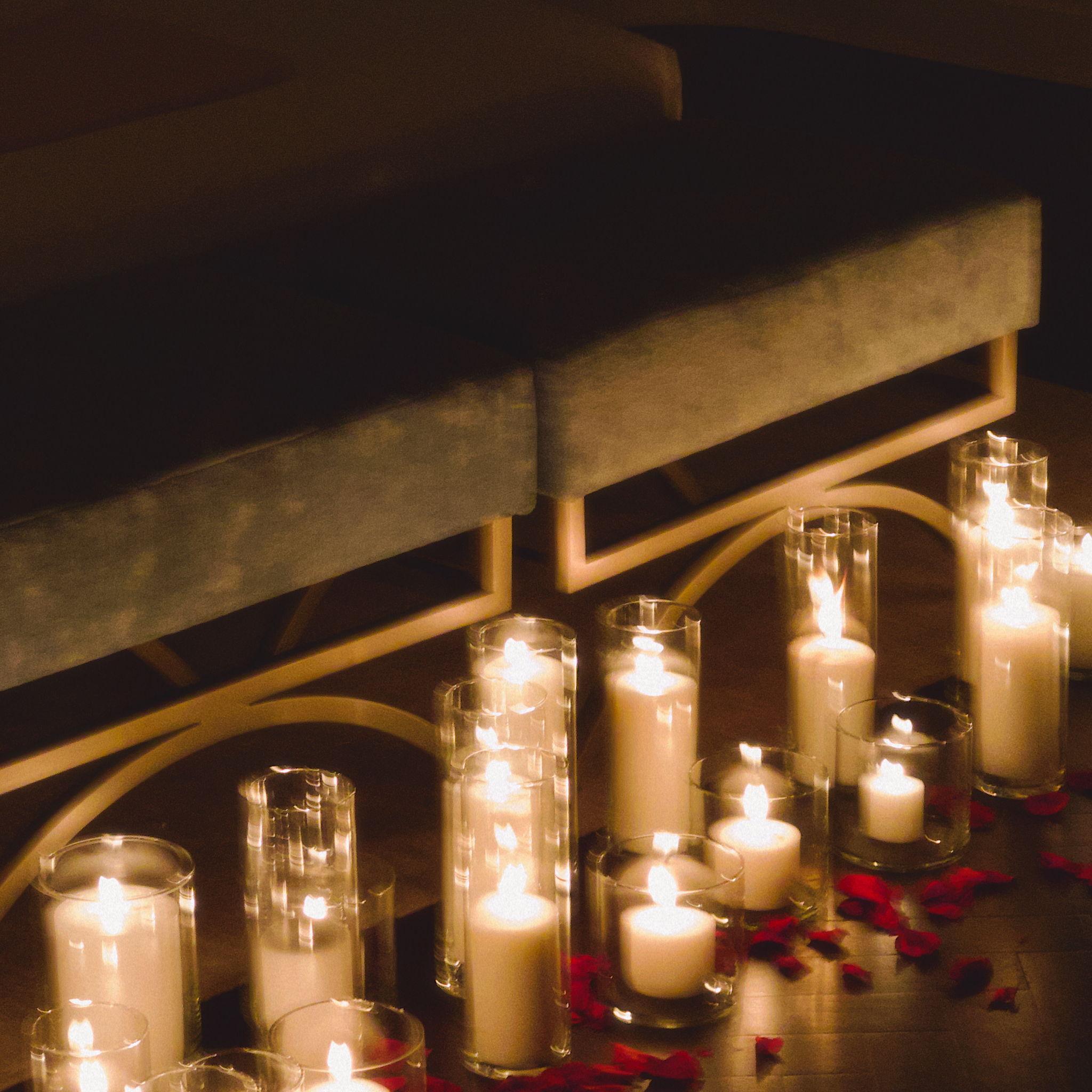 Christian's family helped decorate with dozens of candles for the proposal - they had to move candles around the city of Providence from plan A > plan D!