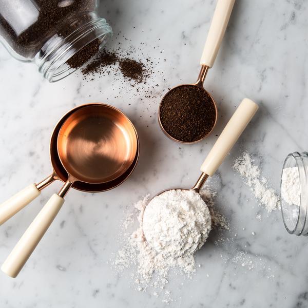 Copper and Ivory Measuring Cups