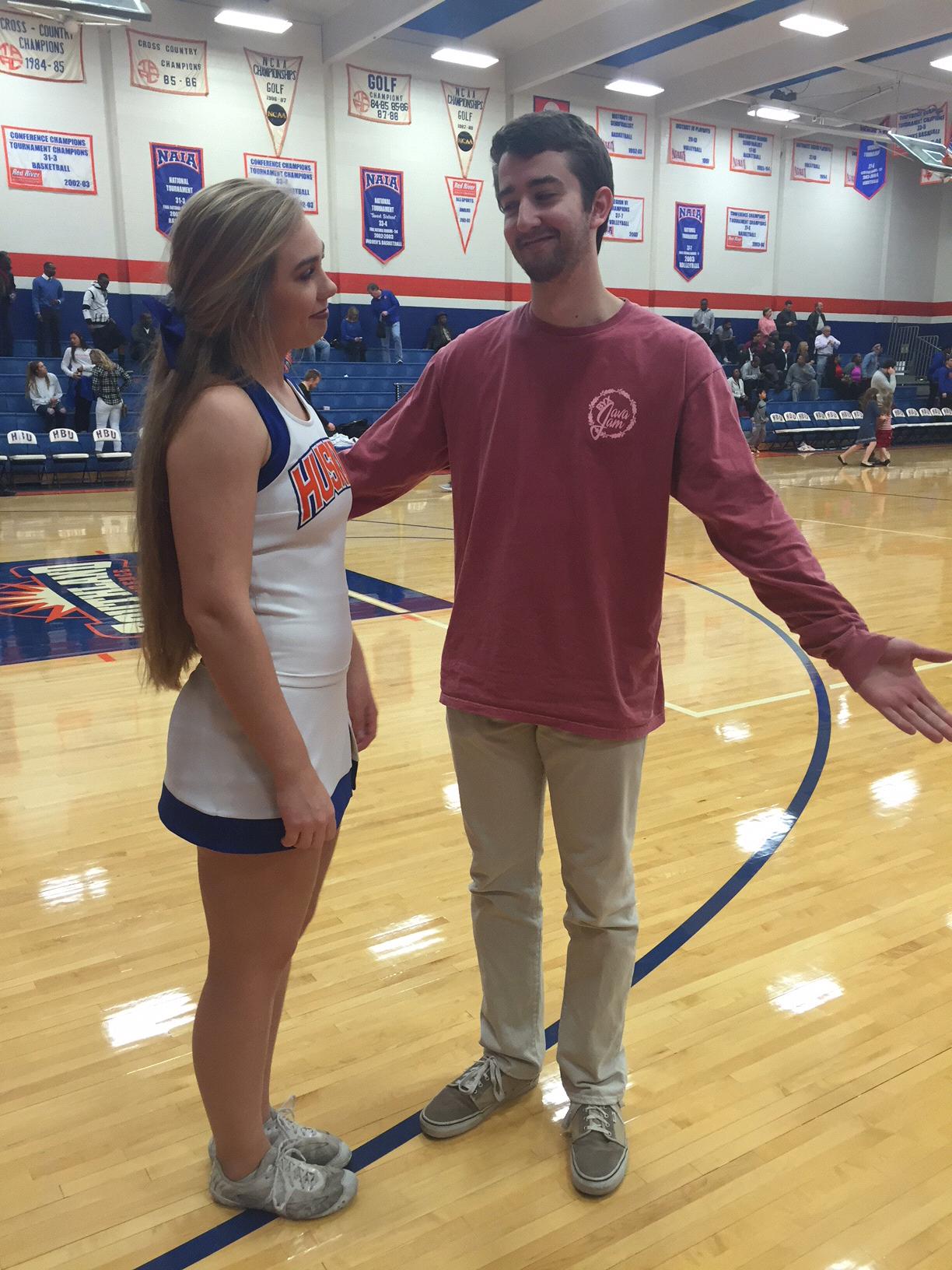 Landin probably just said something silly... Marcella's trying to decide if she should laugh or not.