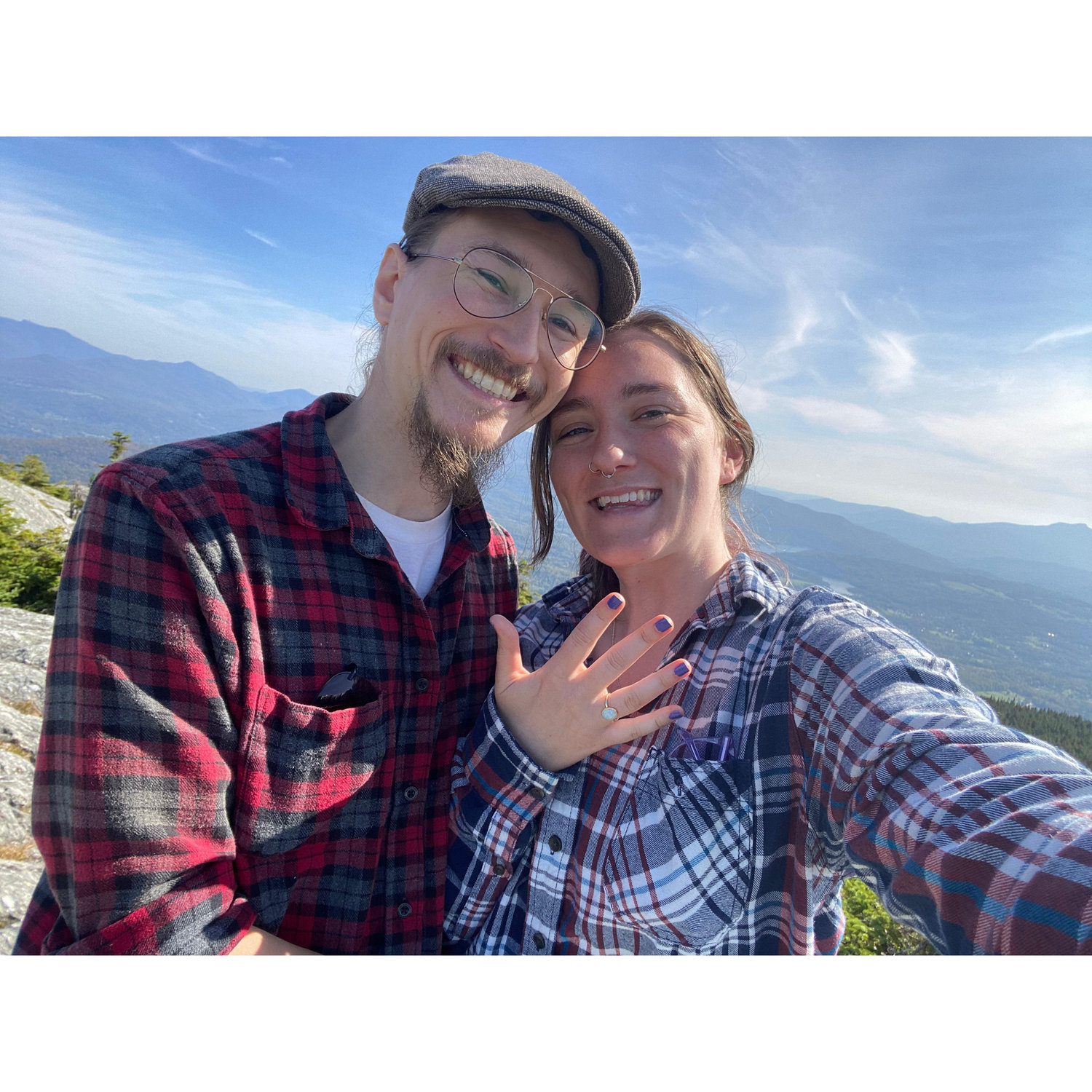 John proposed to Callie on our 8th anniversary in 2023 on the top of Mount Hunger in Waterbury. The trail they were going to take had closed, so they drove 45 minutes to the next trail head