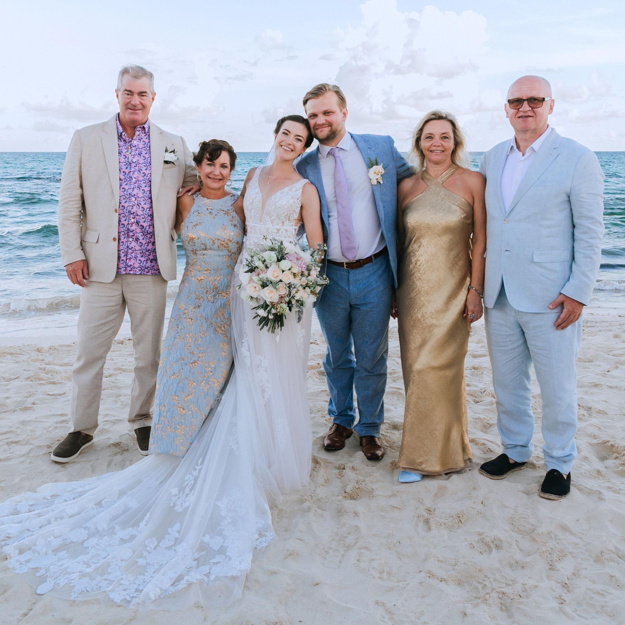 Smiling with our beloved parents, Doug, DeAnnah, Svetlana and Timofey. We love you so much!