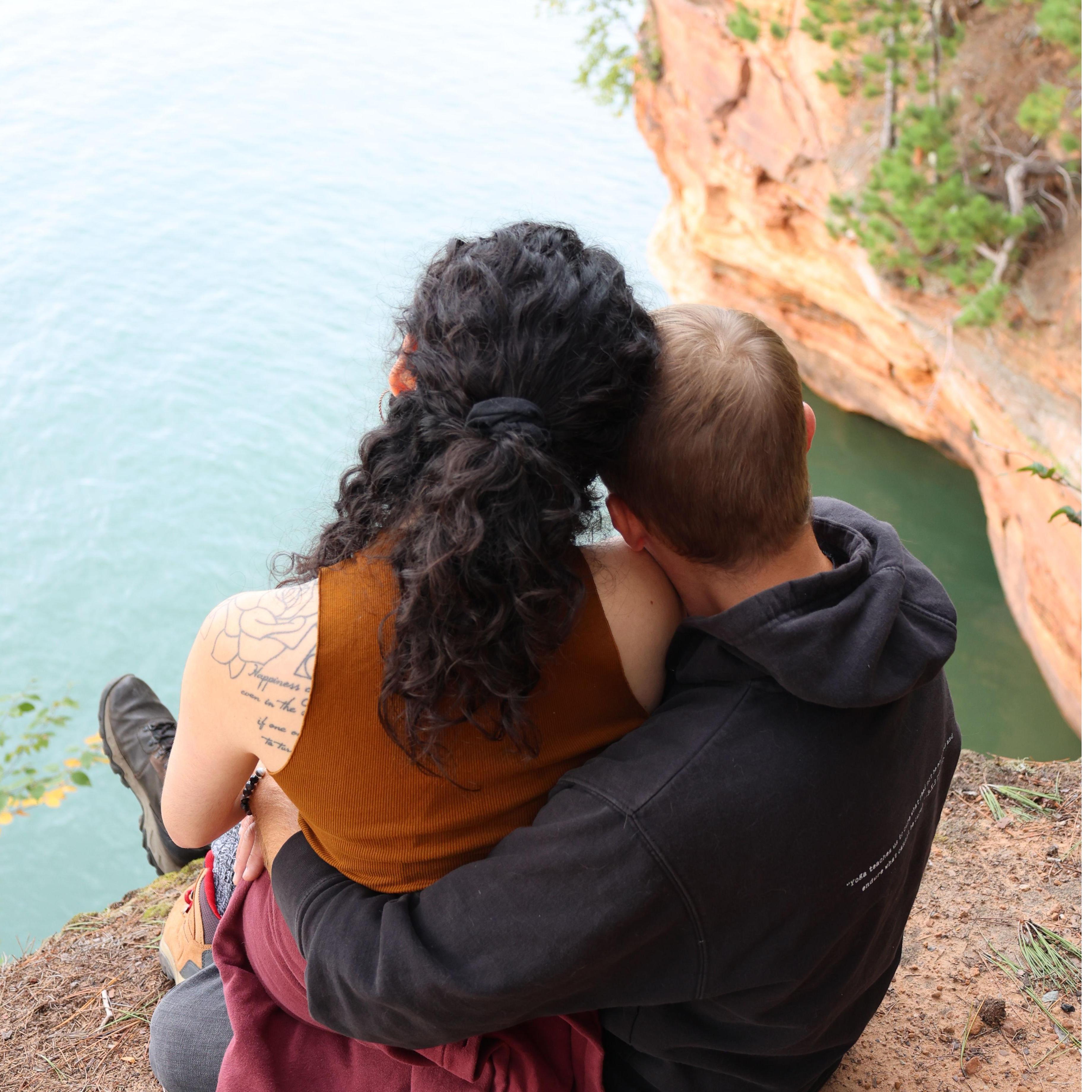 Ash is afraid of heights, but Matt holds her to reassure her that she'll never fall.