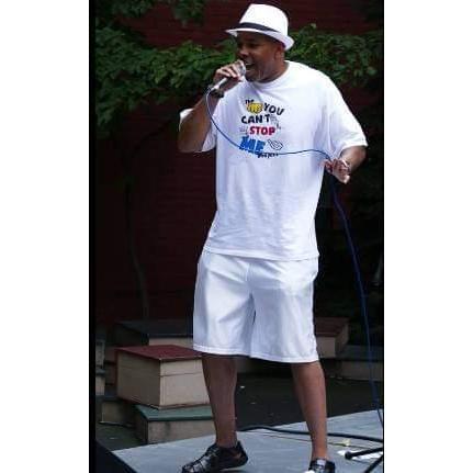 Hank performing with Funk Opus on the grounds of the Ypsilanti Public Library.