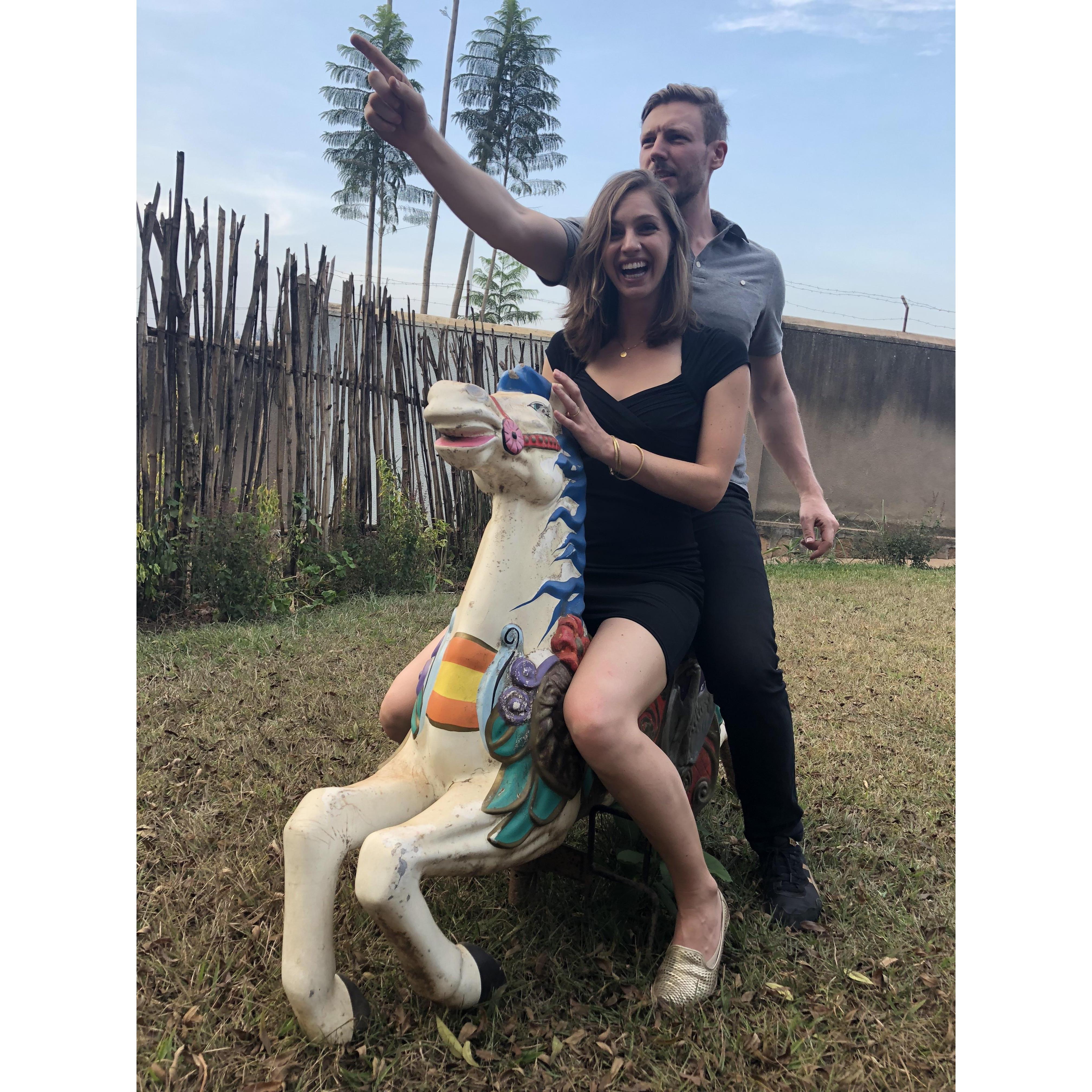 Celebrating our engagement with our carnival horse, Picnic, and lots of wonderful friends (not pictured) in Kigali.