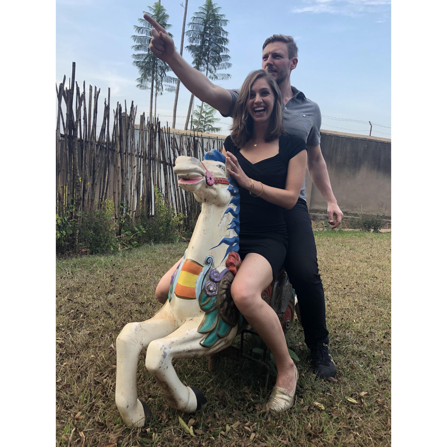 Celebrating our engagement with our carnival horse, Picnic, and lots of wonderful friends (not pictured) in Kigali.