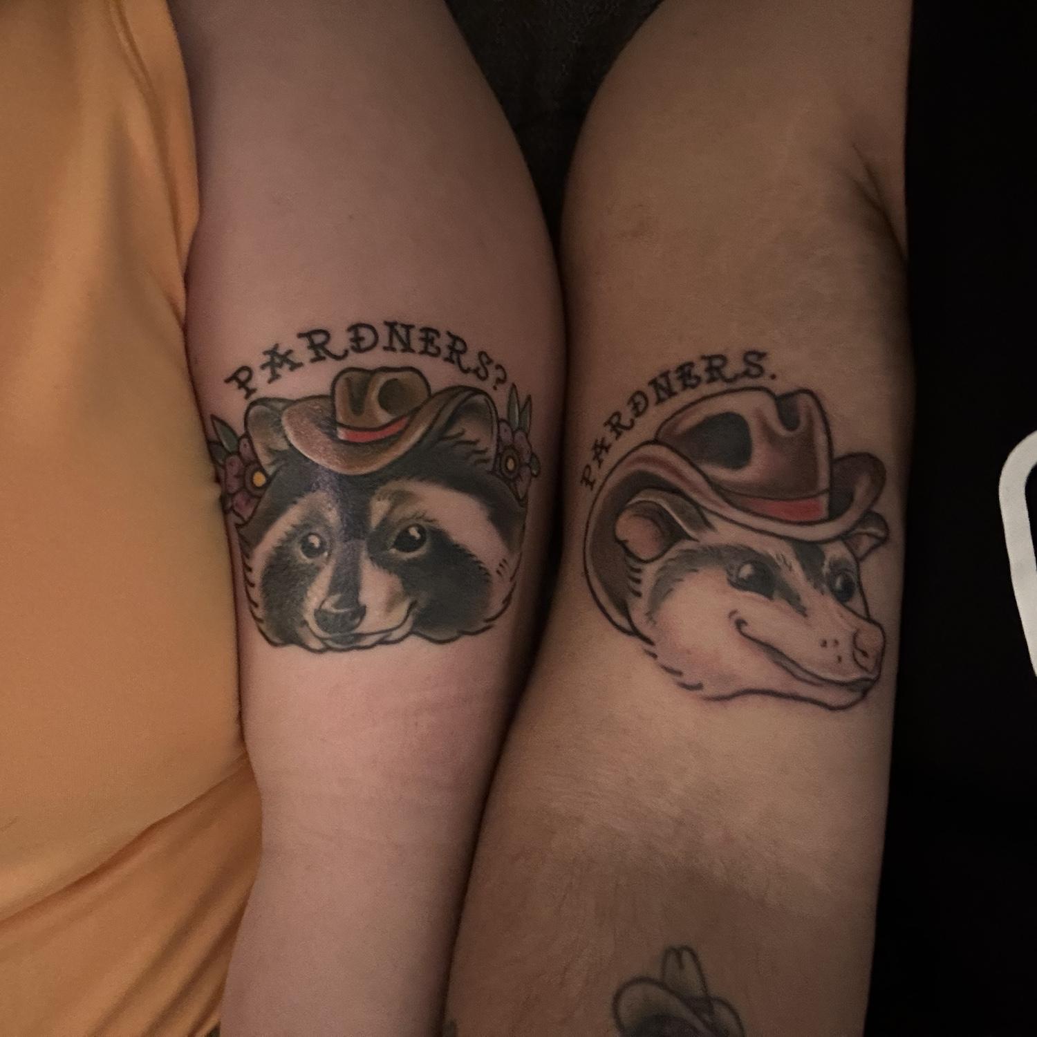 Our "matching" tattoos saying "Pardners?" "Pardners."