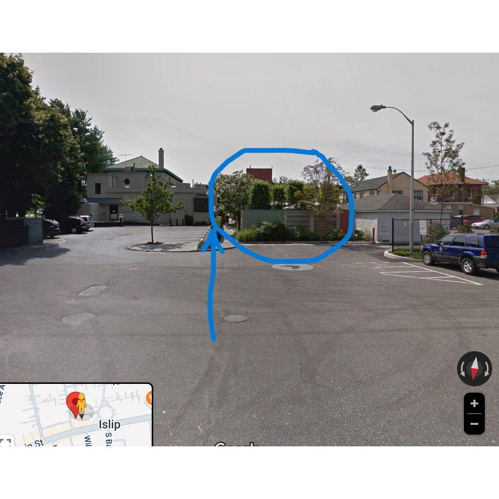 Back of Tellers Next Door from municipal parking lot