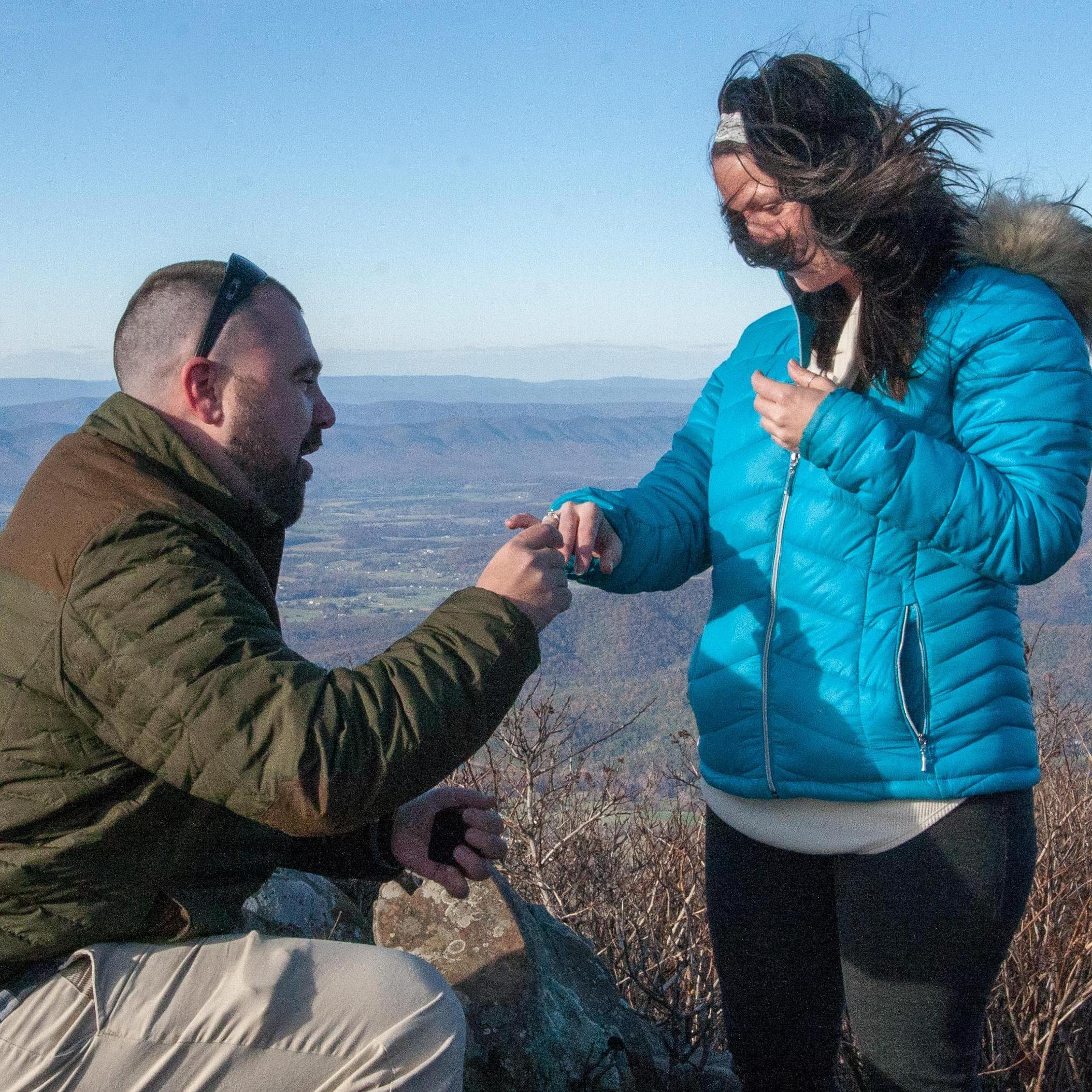 I'm sure Josh was so nervous with how windy it was, and I was so excited with the proposal we didn't realized we put the ring on the wrong hand until a few photos later