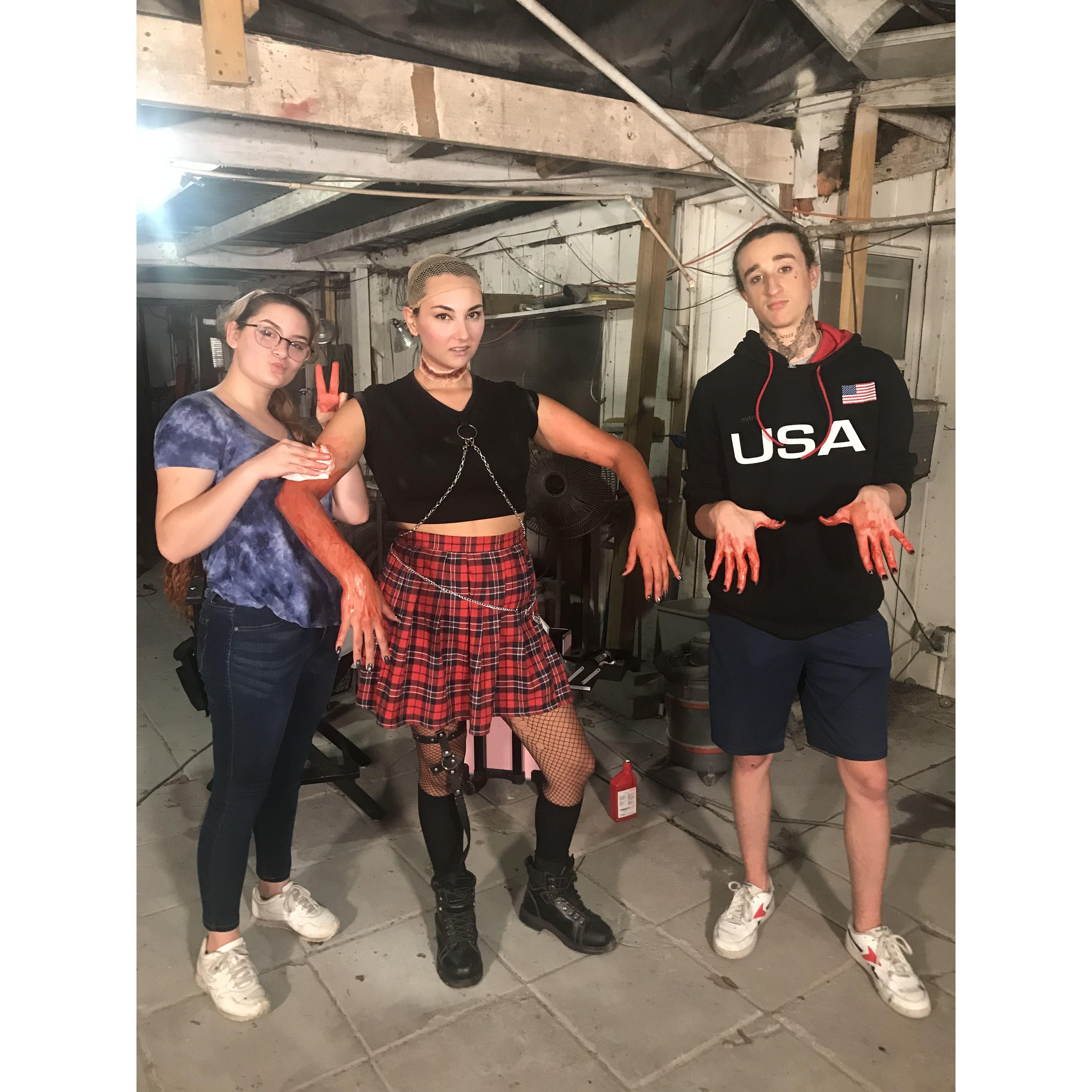 Carson helping Hannah with SFX makeup on set lol