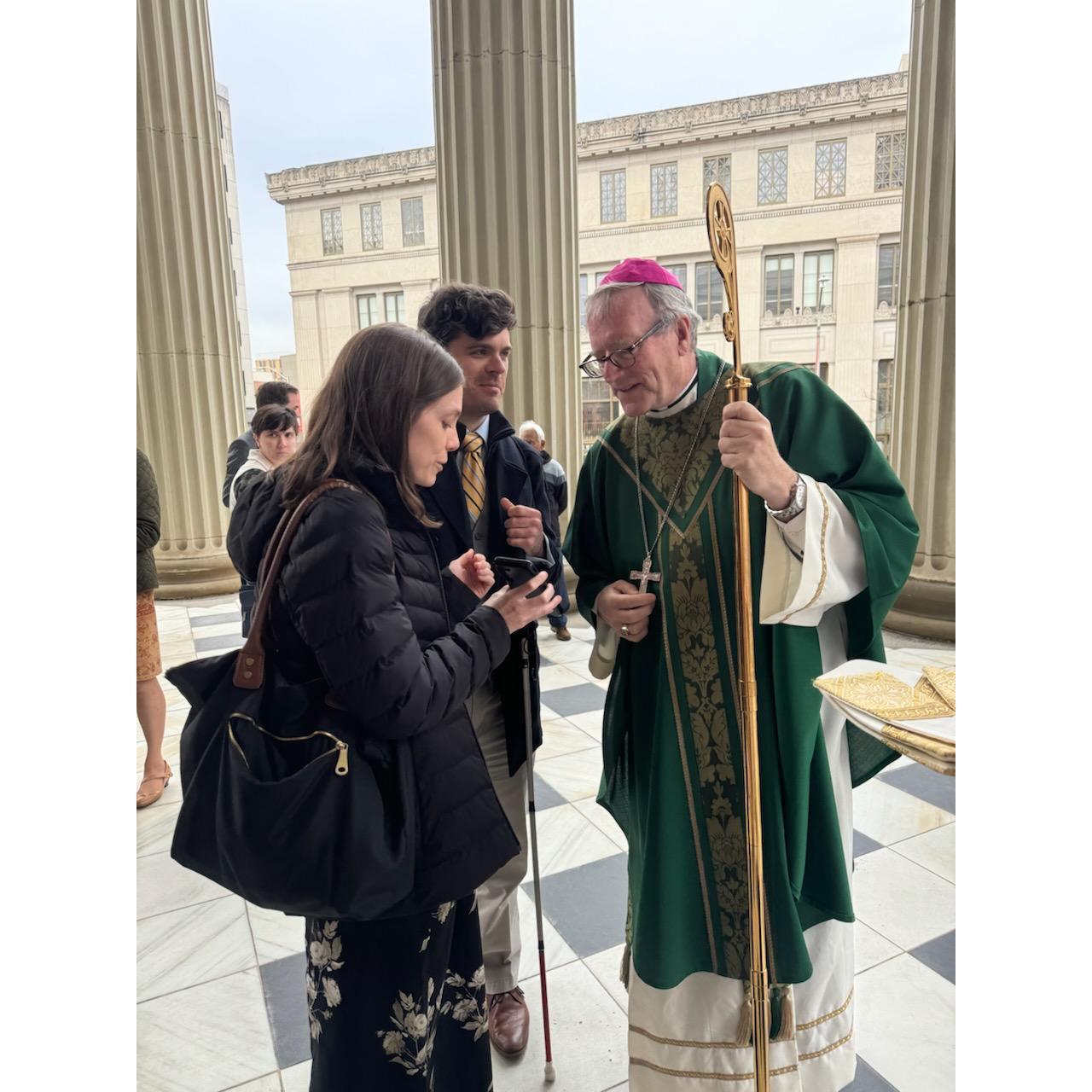 November 2024 -
Us showing Bishop Barron the photo from a year prior and telling him that we're engaged now!