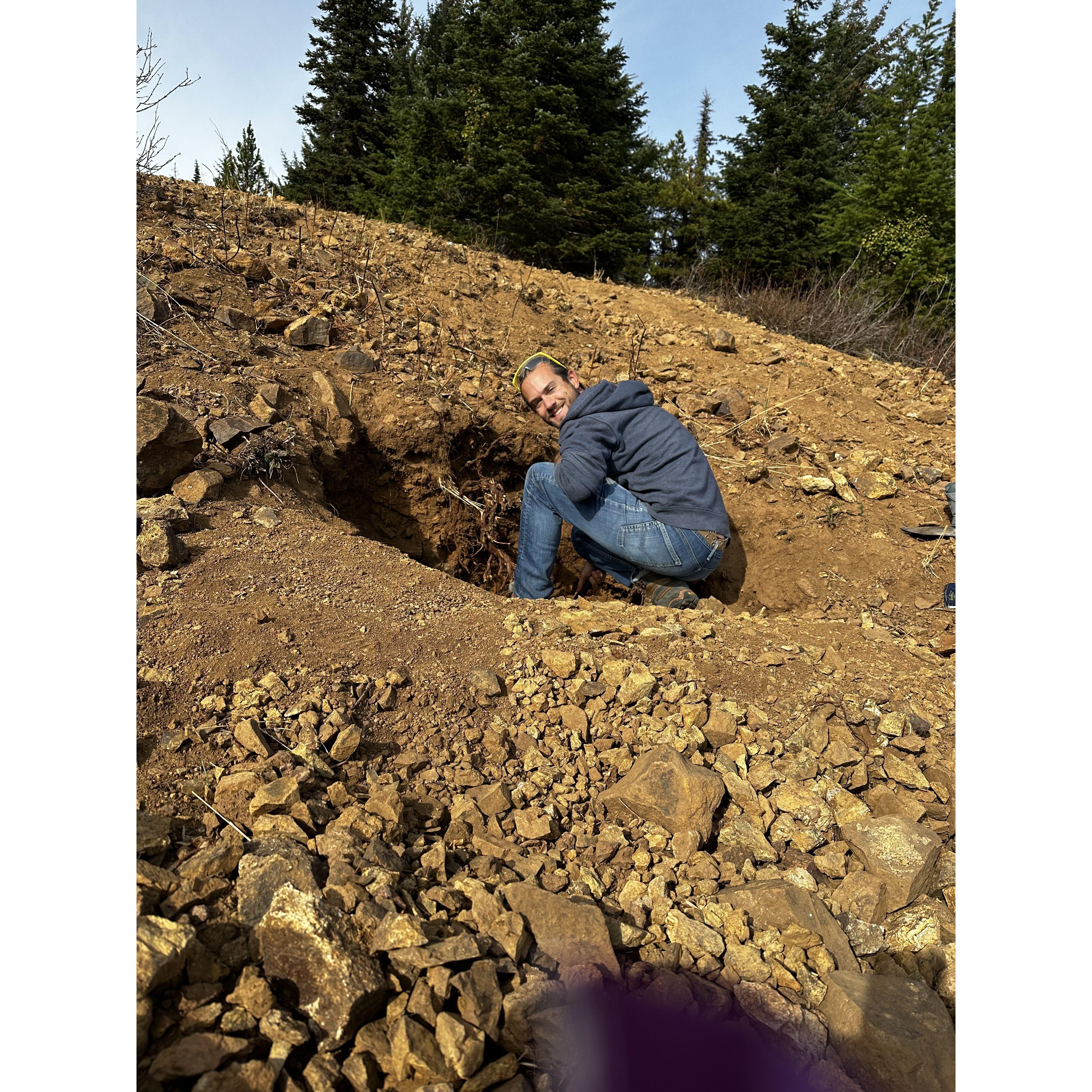Ryan digging holes near Red Top Lookout, searching for agates and geodes