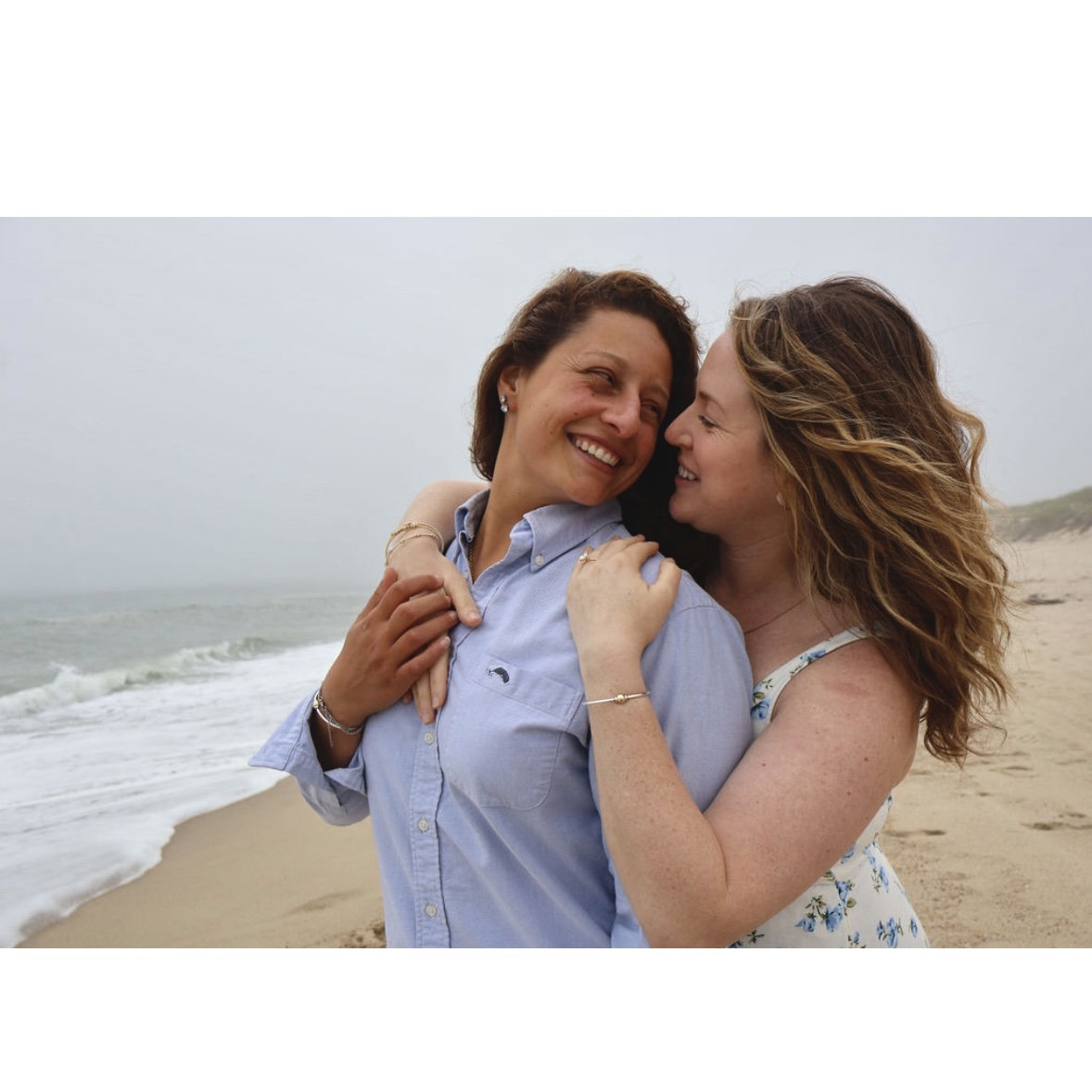 Lovebirds at the beach, courtesy of Taylor Chelo