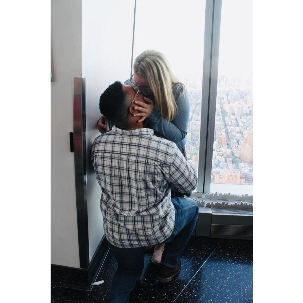 He popped the question, I said “YES” and right after our friend snapped this picture of us.