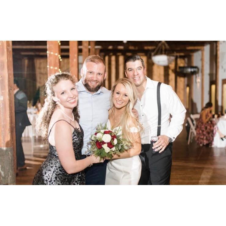Catching the bouquet at Emily and Kevin's wedding