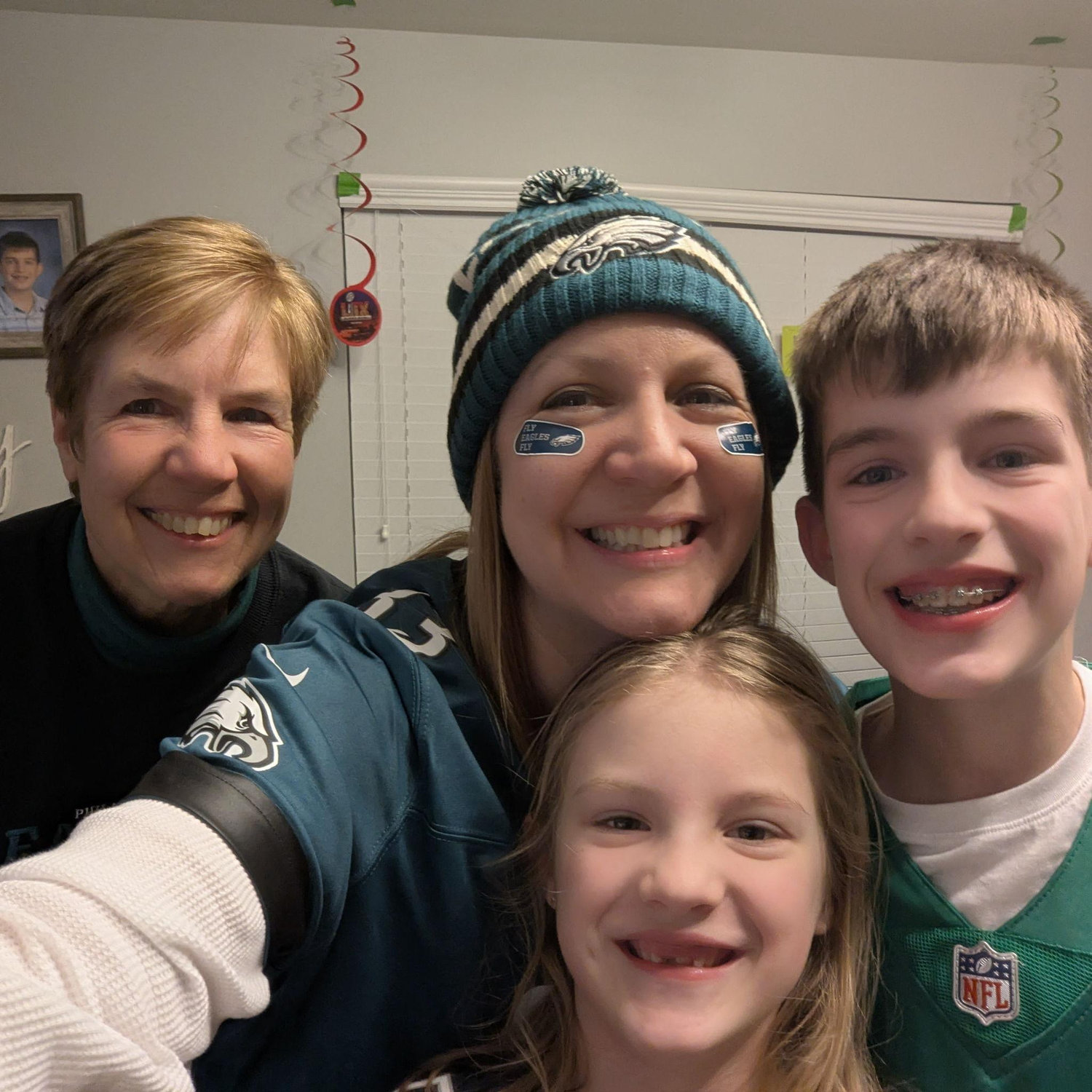 Another Super Bowl victory pic with MOB, the Man of Honor, and our Junior Bridesmaid-- because we can! :)