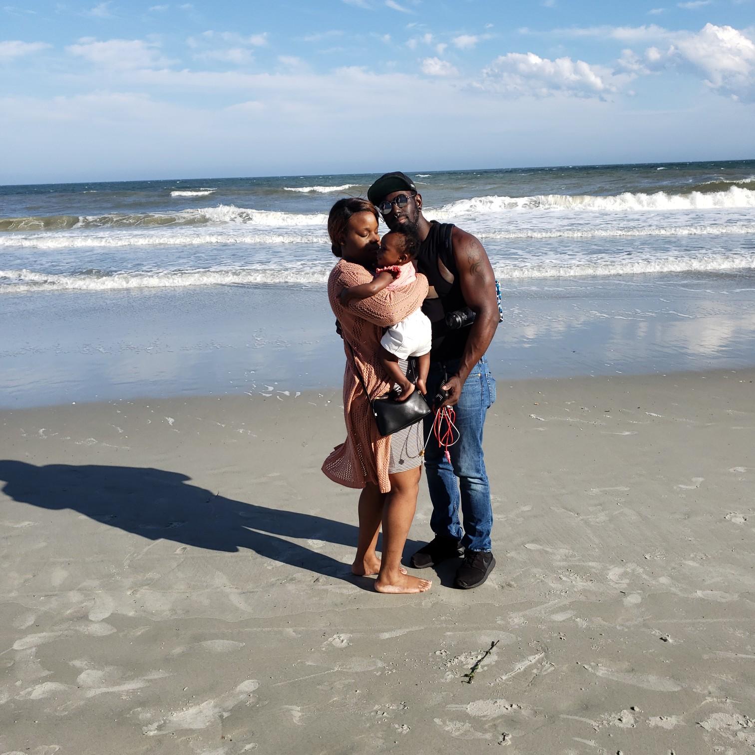 Our daughter, Raquanza with her fiancé, Travis and their daughter, Lyric Noelle at N. Myrtle Beach, one of our favorite places on God's green earth.